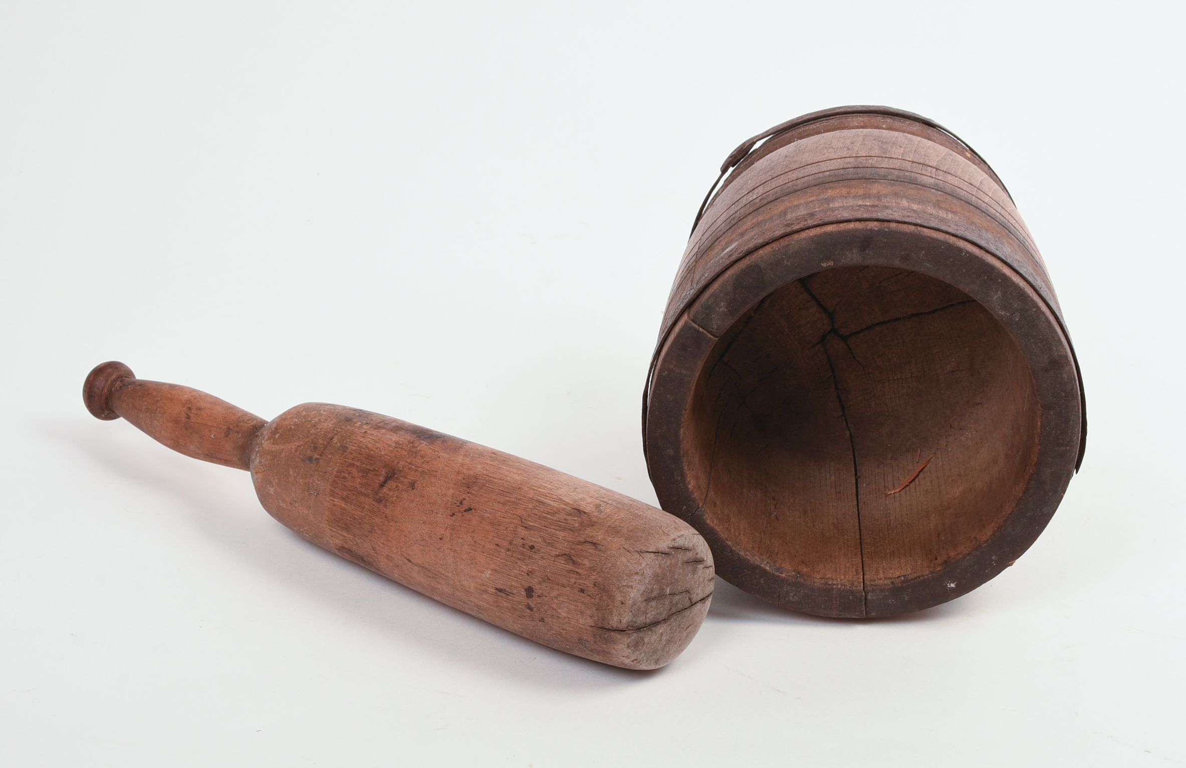 IRON BOUND MORTAR AND PESTLE.