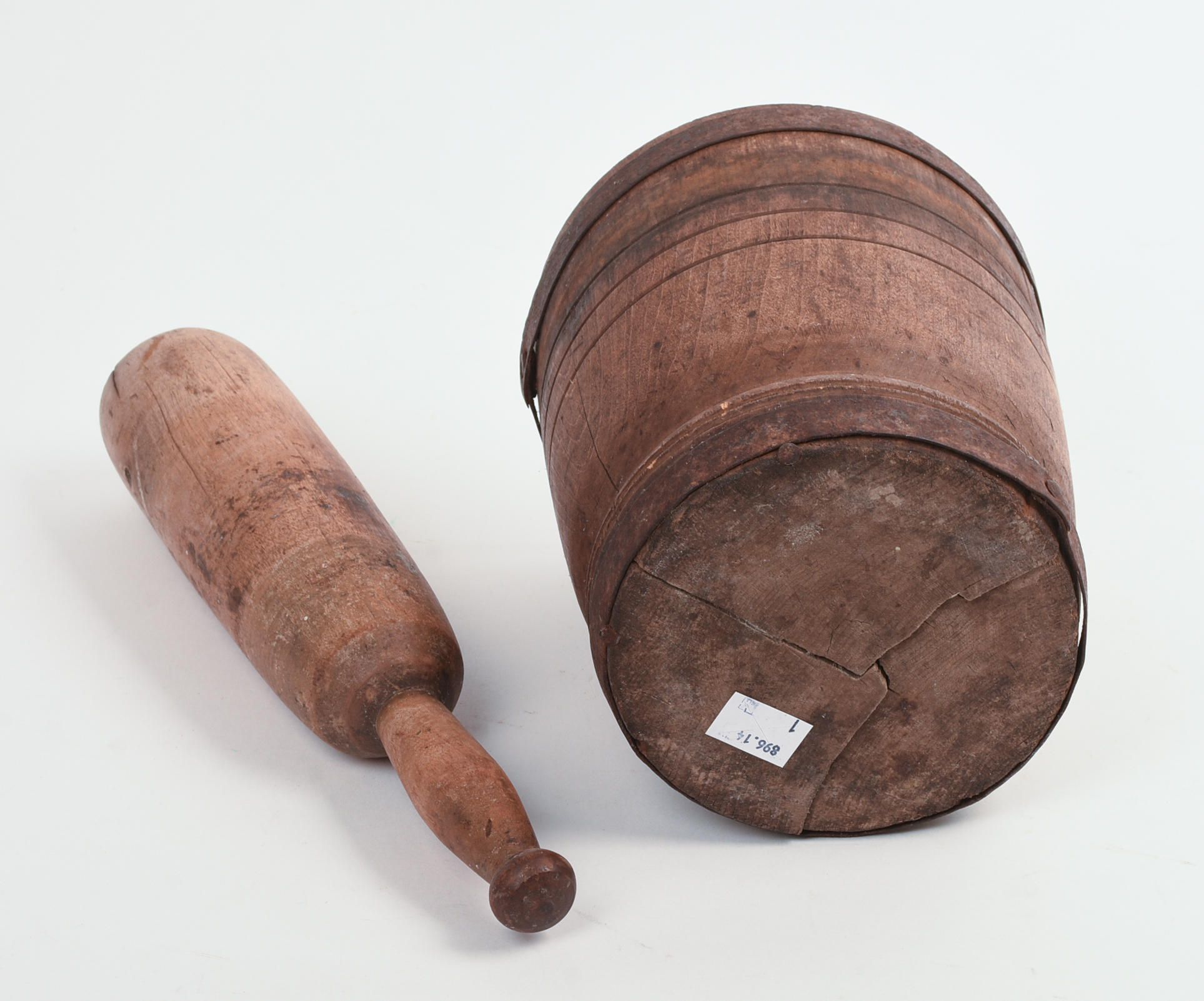IRON BOUND MORTAR AND PESTLE.