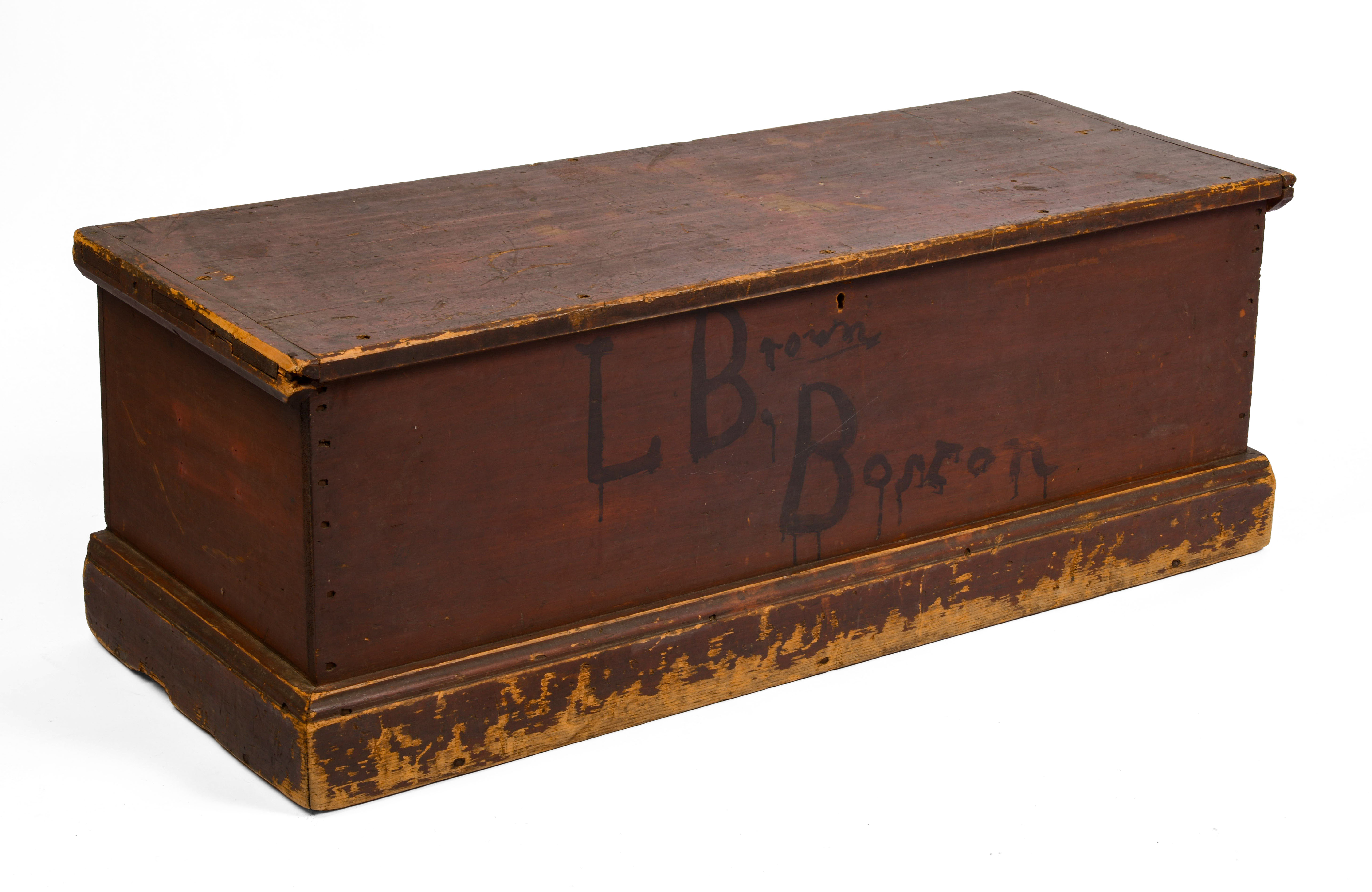 PINE BLANKET CHEST IN OLD RED WITH BOSTON ADDRESS.