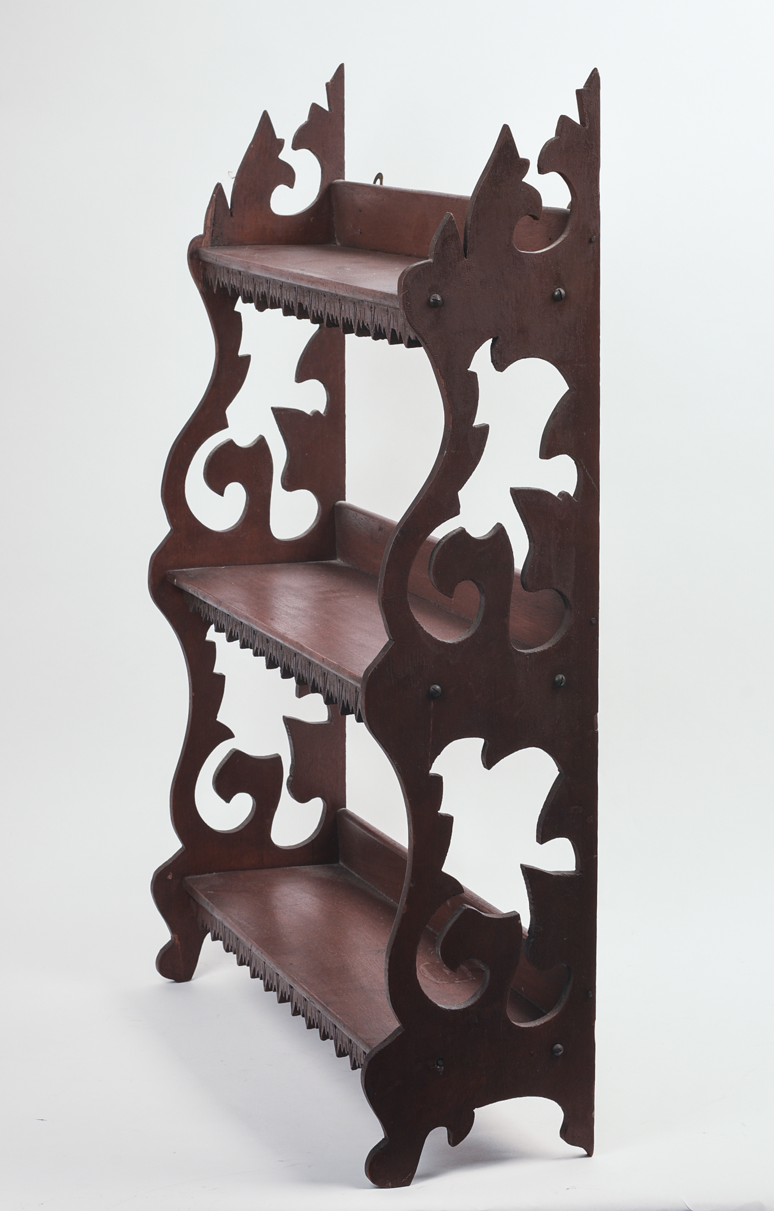 CHIP CARVED WALL SHELF WITH SHAPED SIDES.