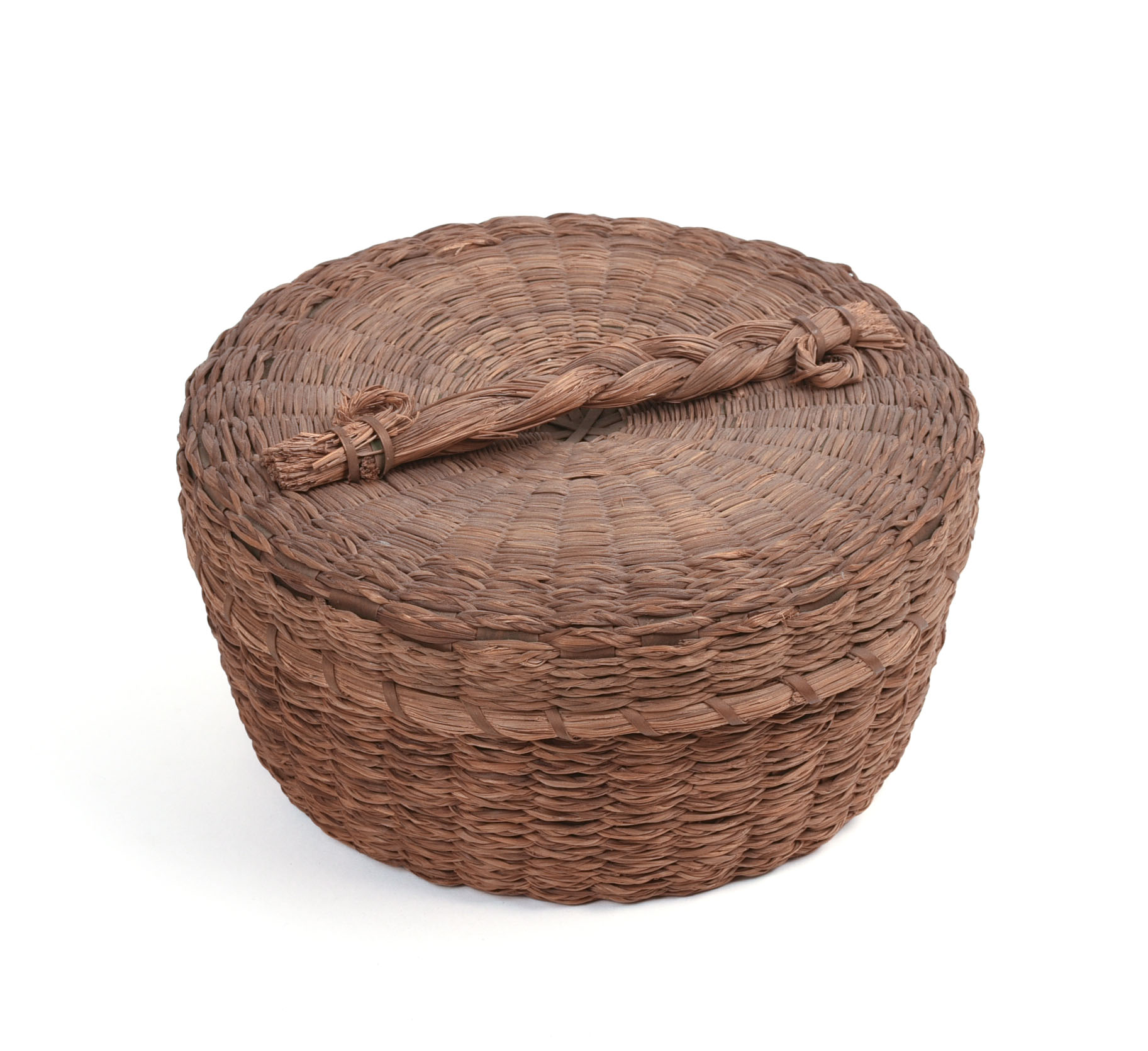 NATIVE AMERICAN SWEETGRASS BASKET.