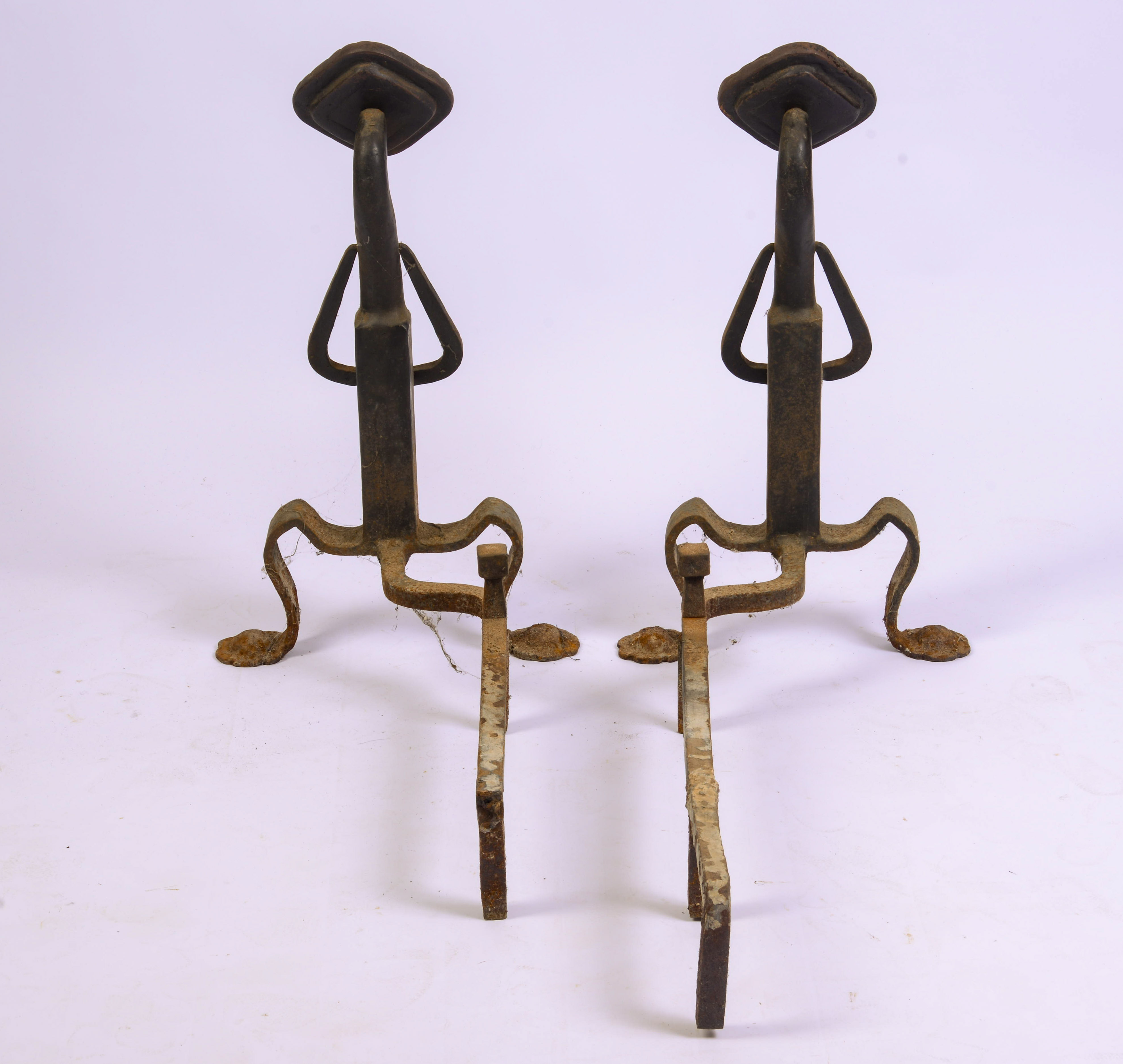 PAIR OF WROUGHT IRON ARTS & CRAFTS ANDIRONS.