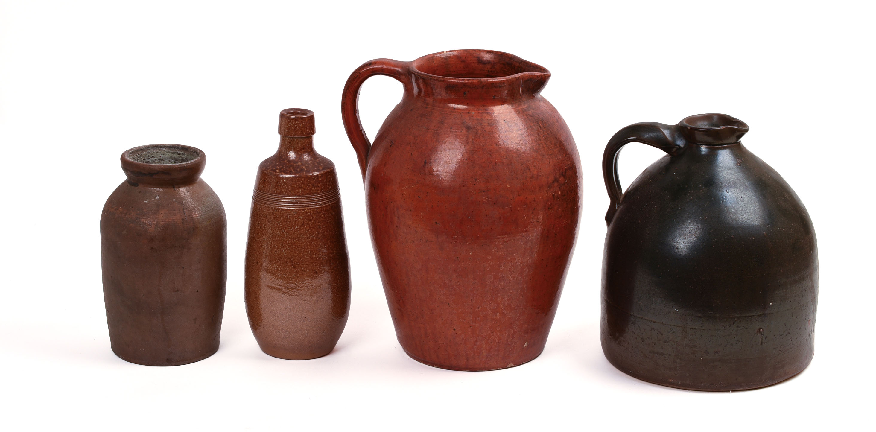 FOUR STONEWARE PIECES.