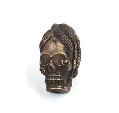 UNUSUAL SKULL AND OCTOPUS MATCH SAFE. 2 x 1 x 1.5 inches.