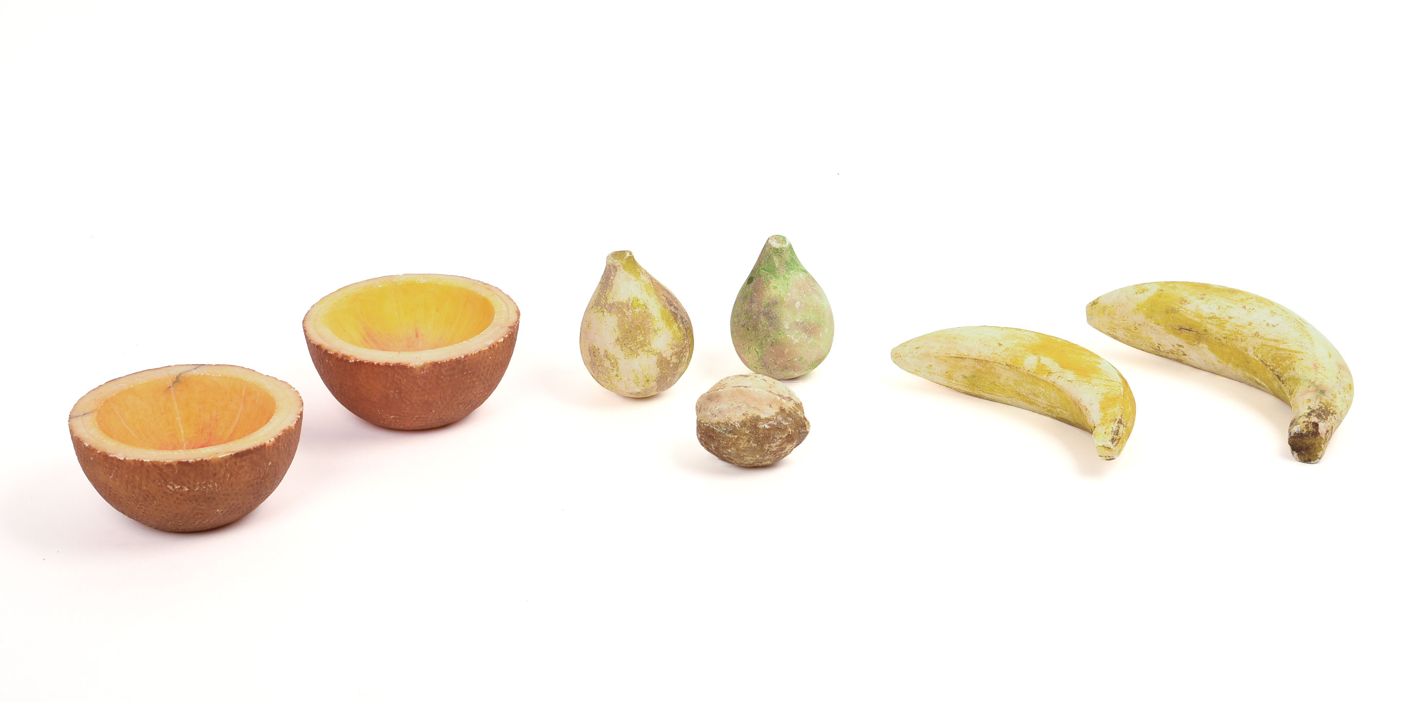 SIX PIECES OF STONE FRUIT