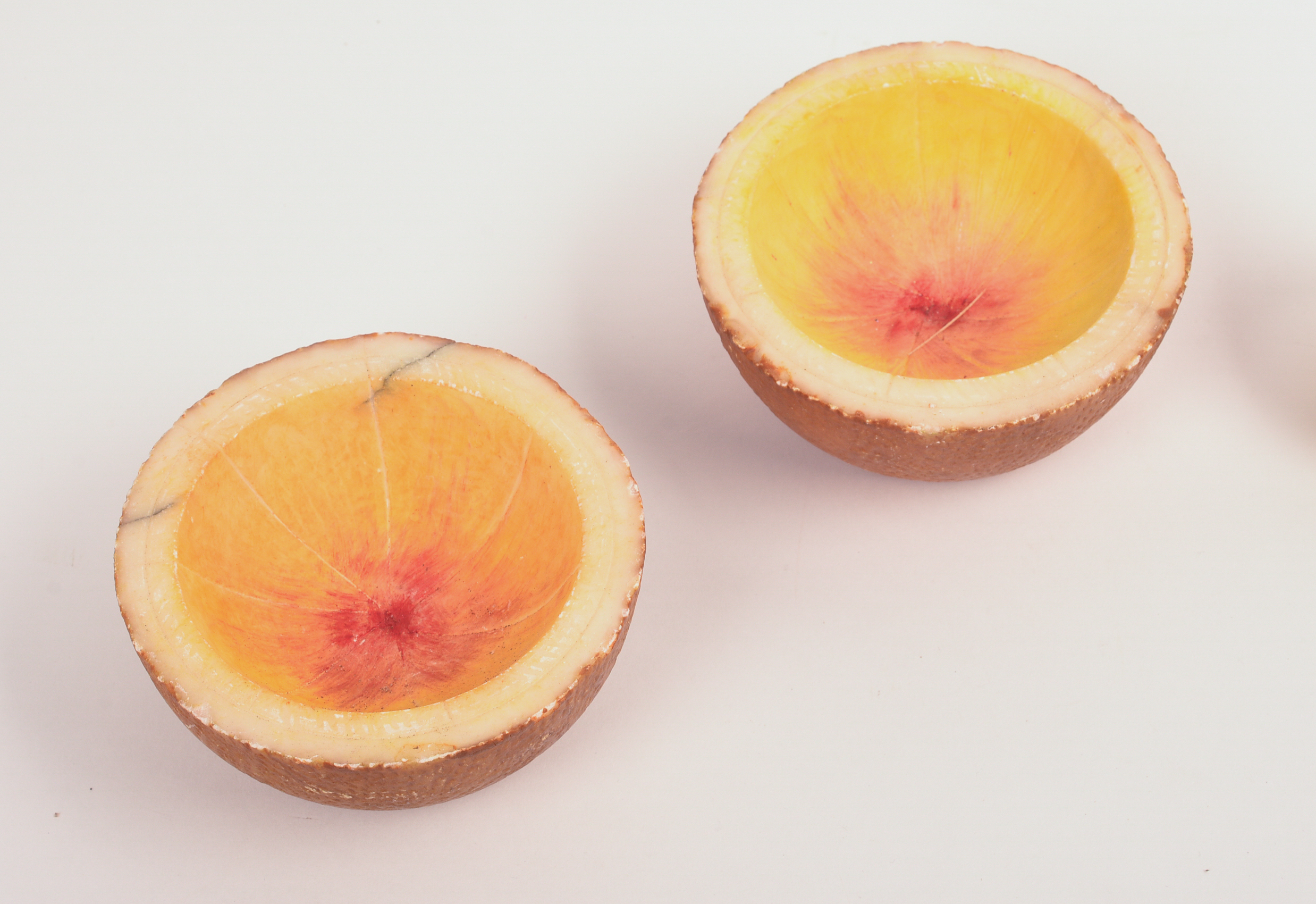 SIX PIECES OF STONE FRUIT