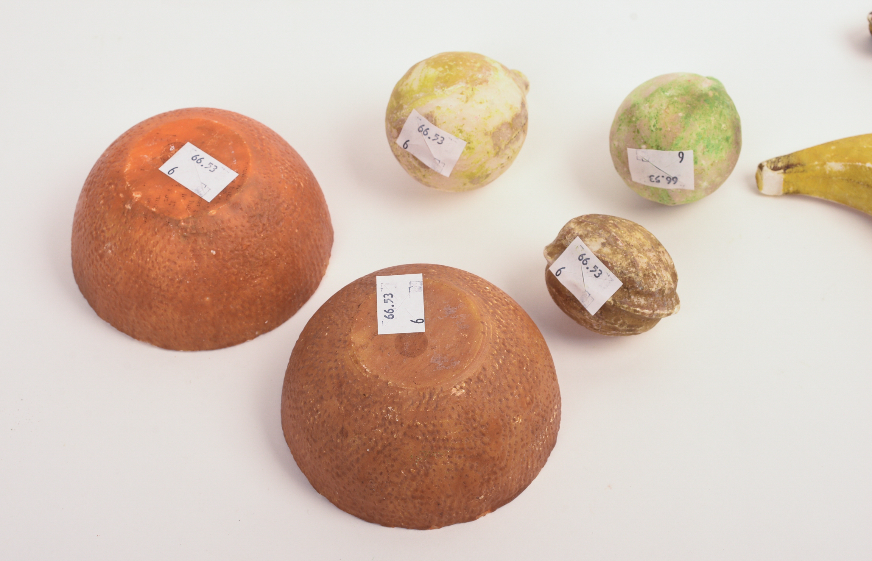 SIX PIECES OF STONE FRUIT