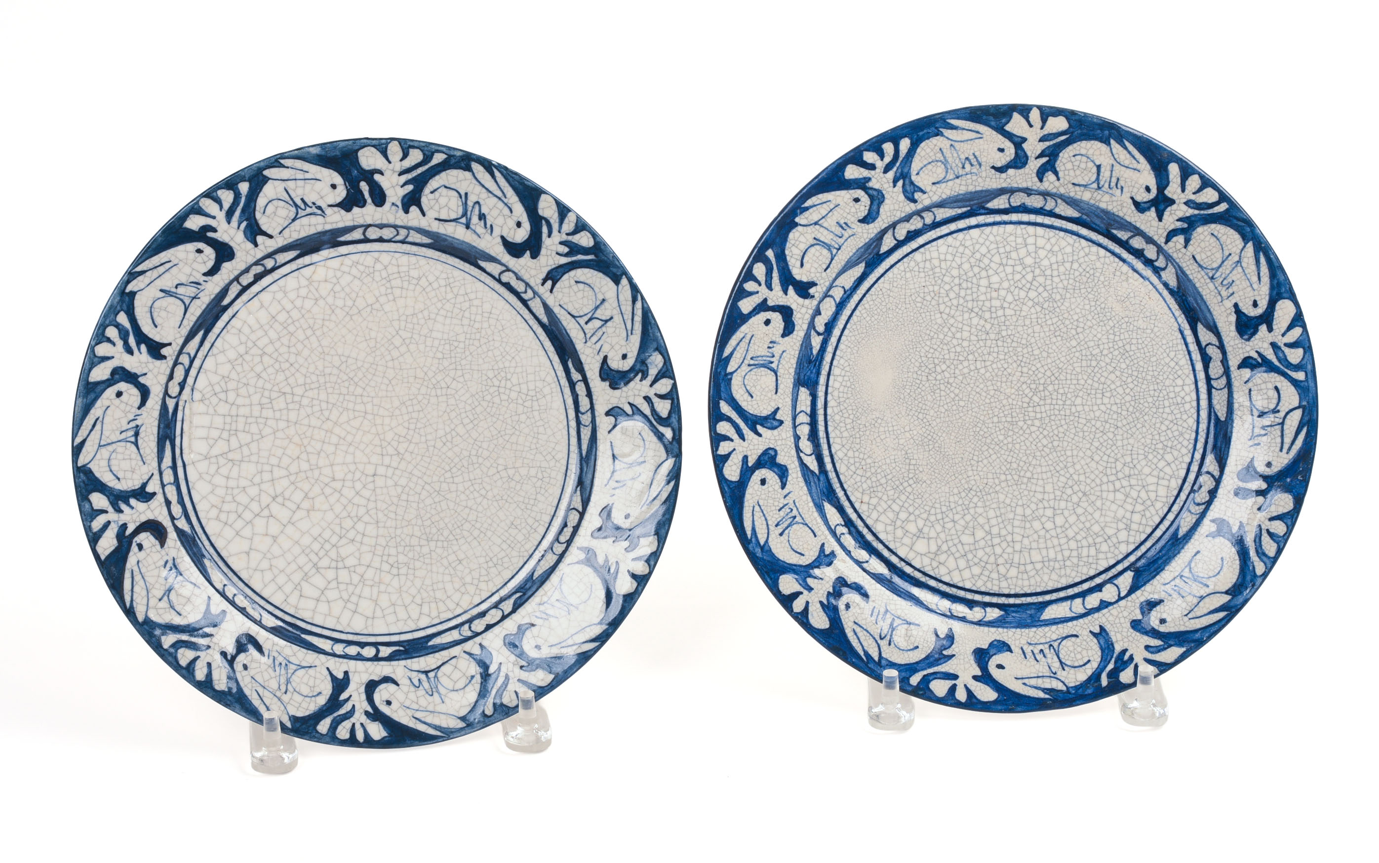 TWO DEDHAM POTTERY RABBIT PATTERN PLATES.