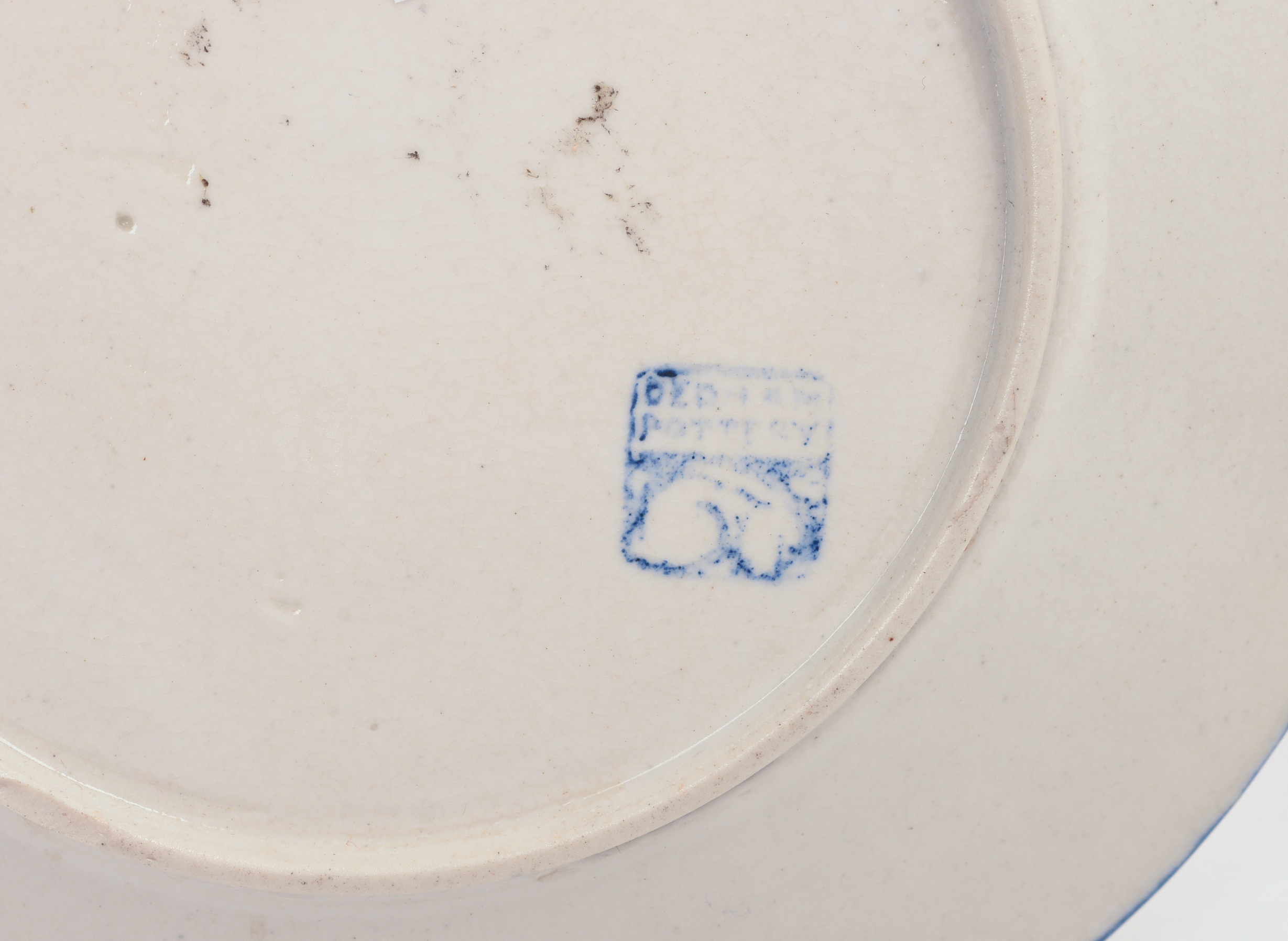 FOUR DEDHAM POTTERY FLORAL PATTERN PLATES.