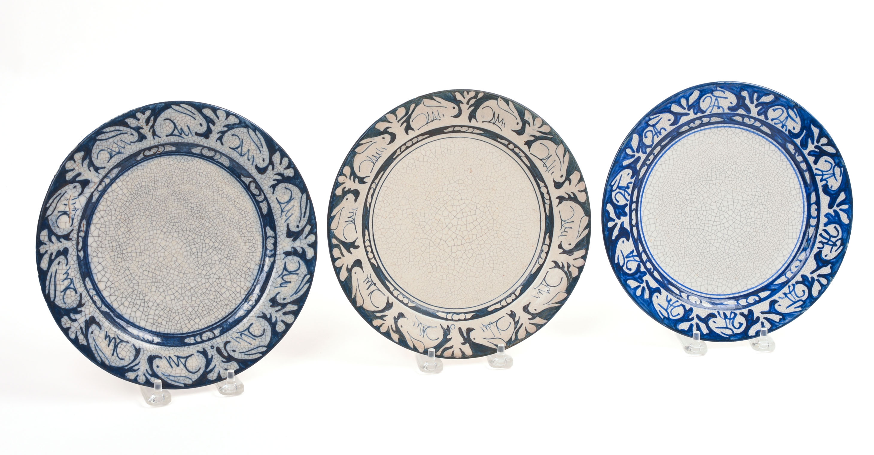 THREE DEDHAM POTTERY RABBIT PATTERN PLATES.