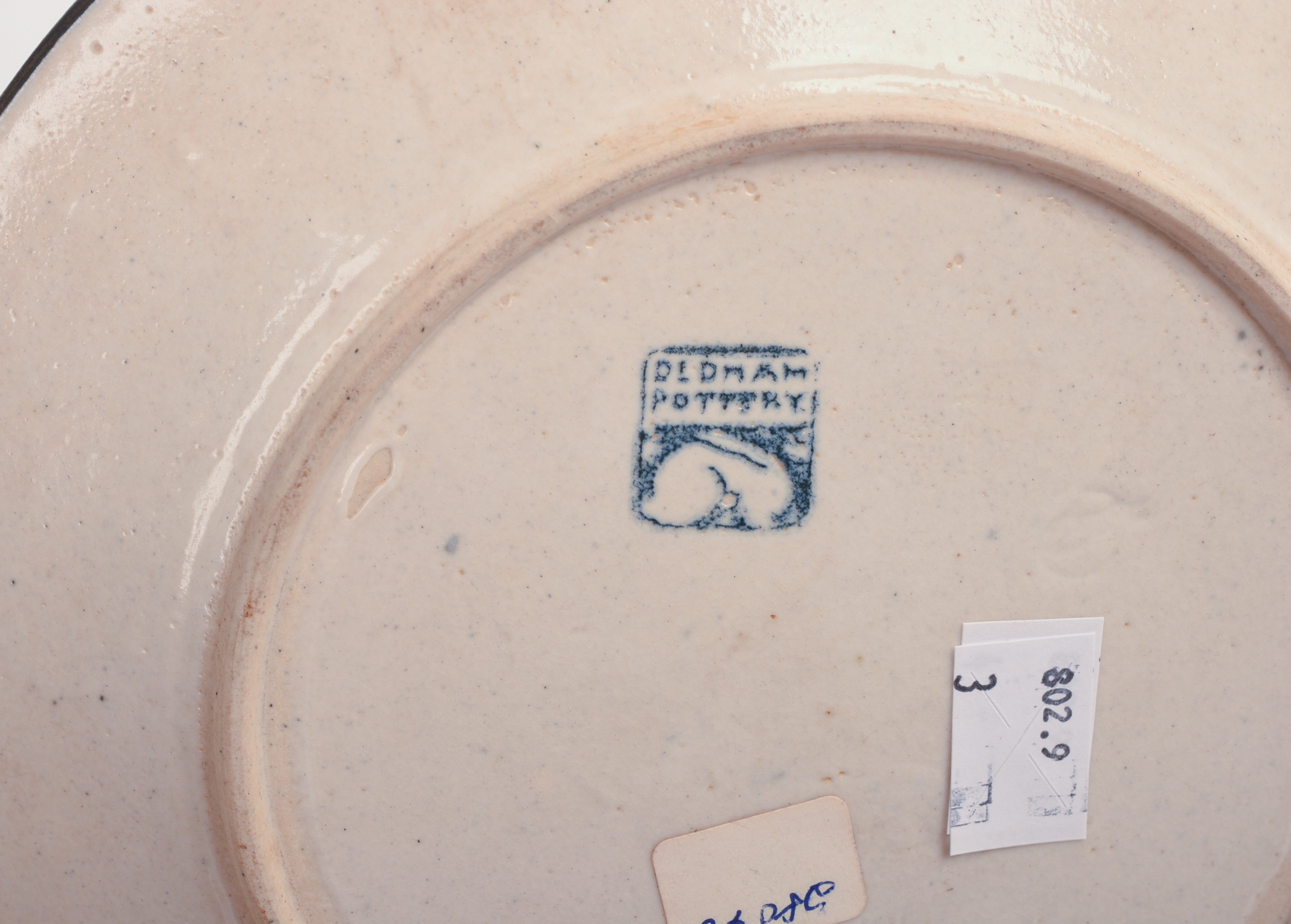 THREE DEDHAM POTTERY RABBIT PATTERN PLATES.