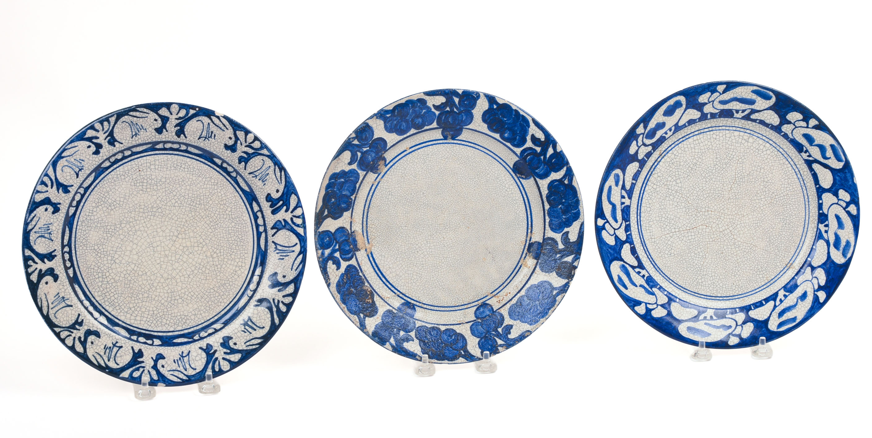 THREE DEDHAM POTTERY PLATES.