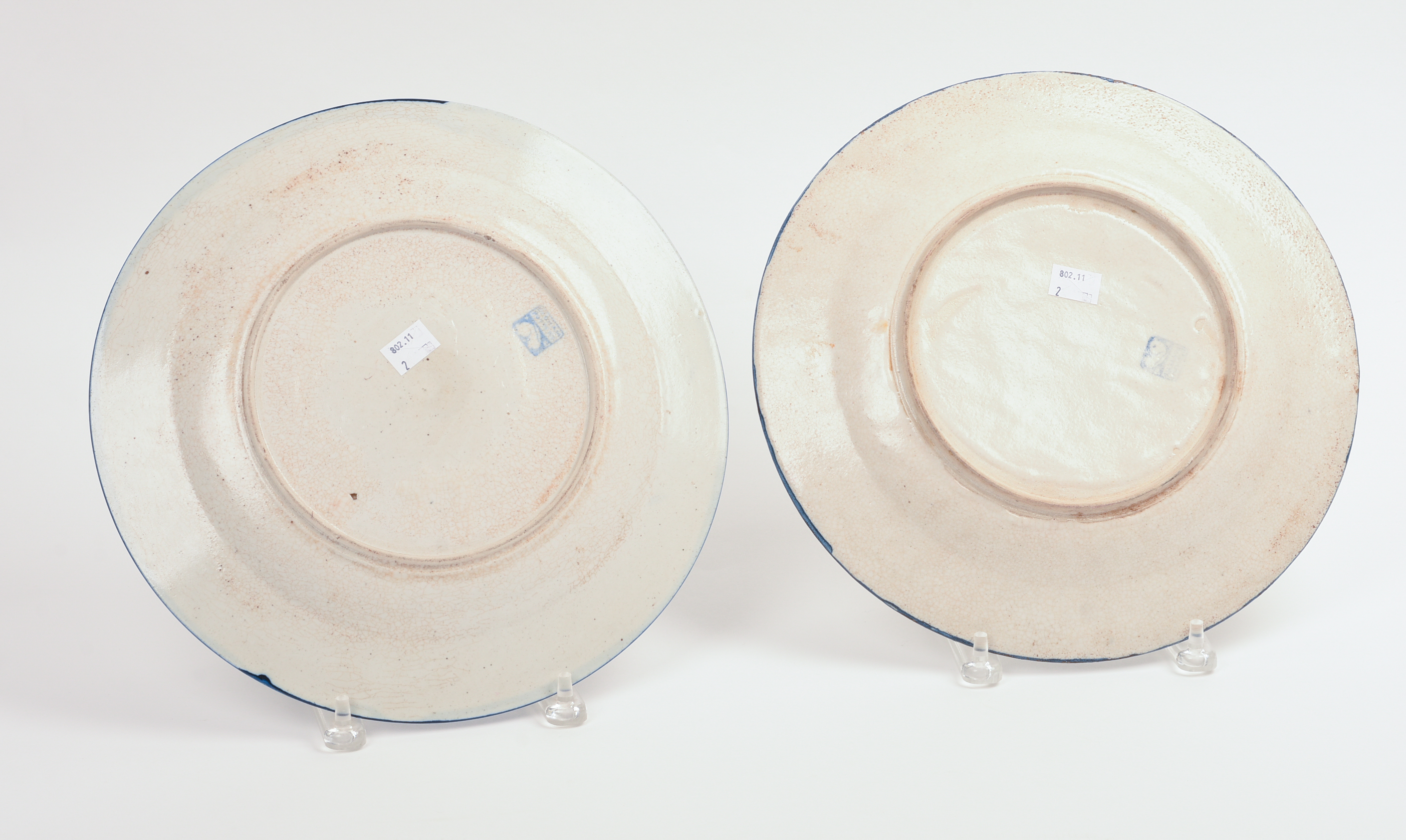 TWO DEDHAM POTTERY RABBIT PATTERN SERVING PLATES.