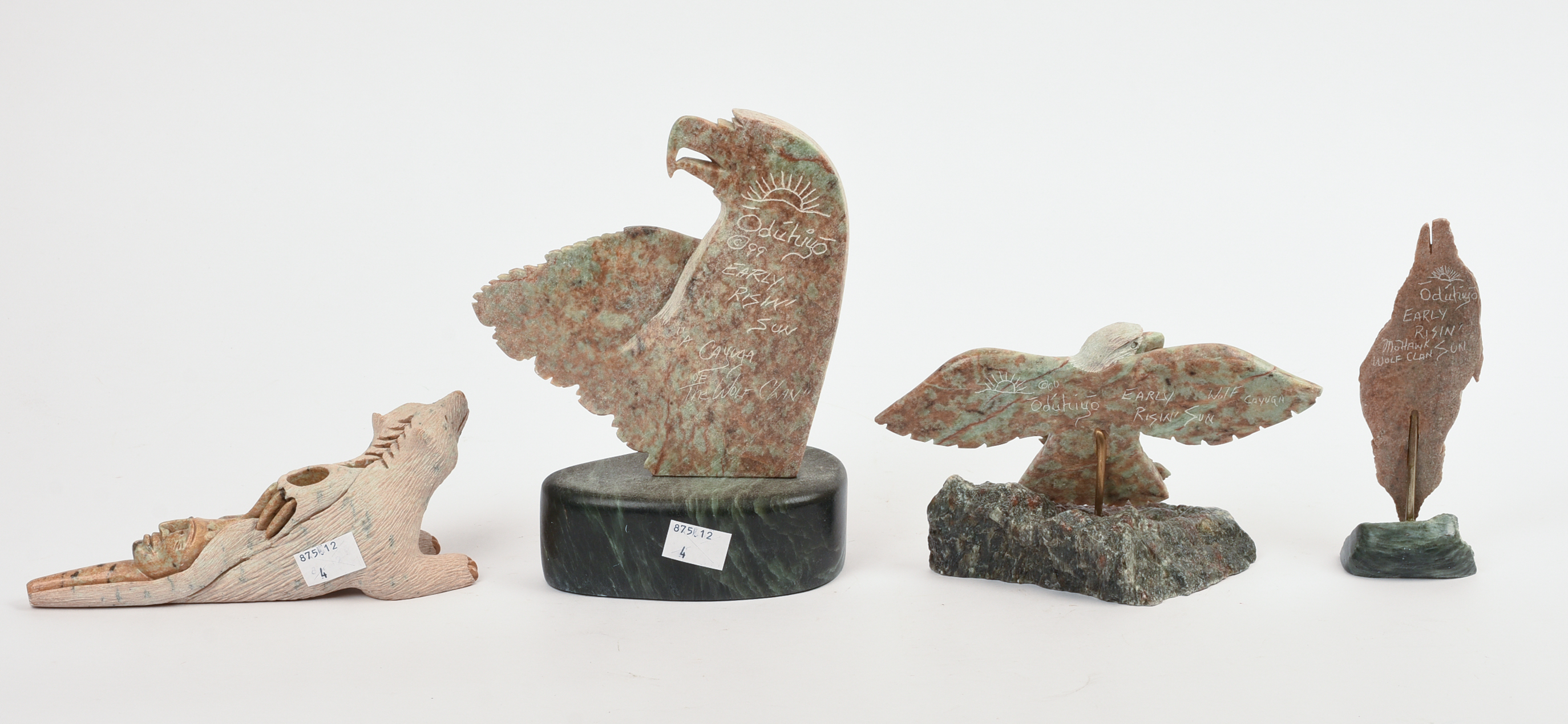 FOUR NATIVE AMERICAN CARVED STONE SCULPTURES.