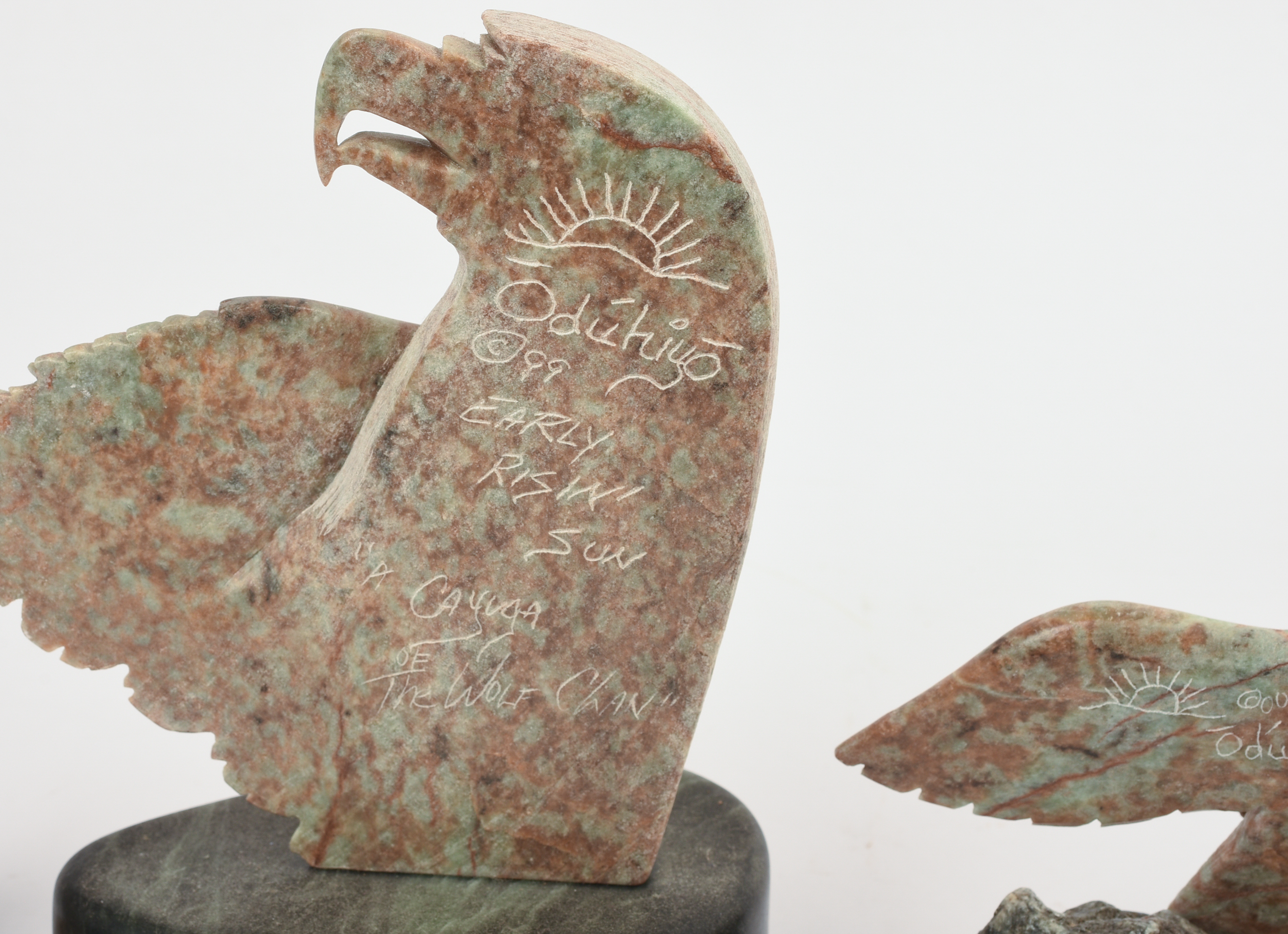 FOUR NATIVE AMERICAN CARVED STONE SCULPTURES.
