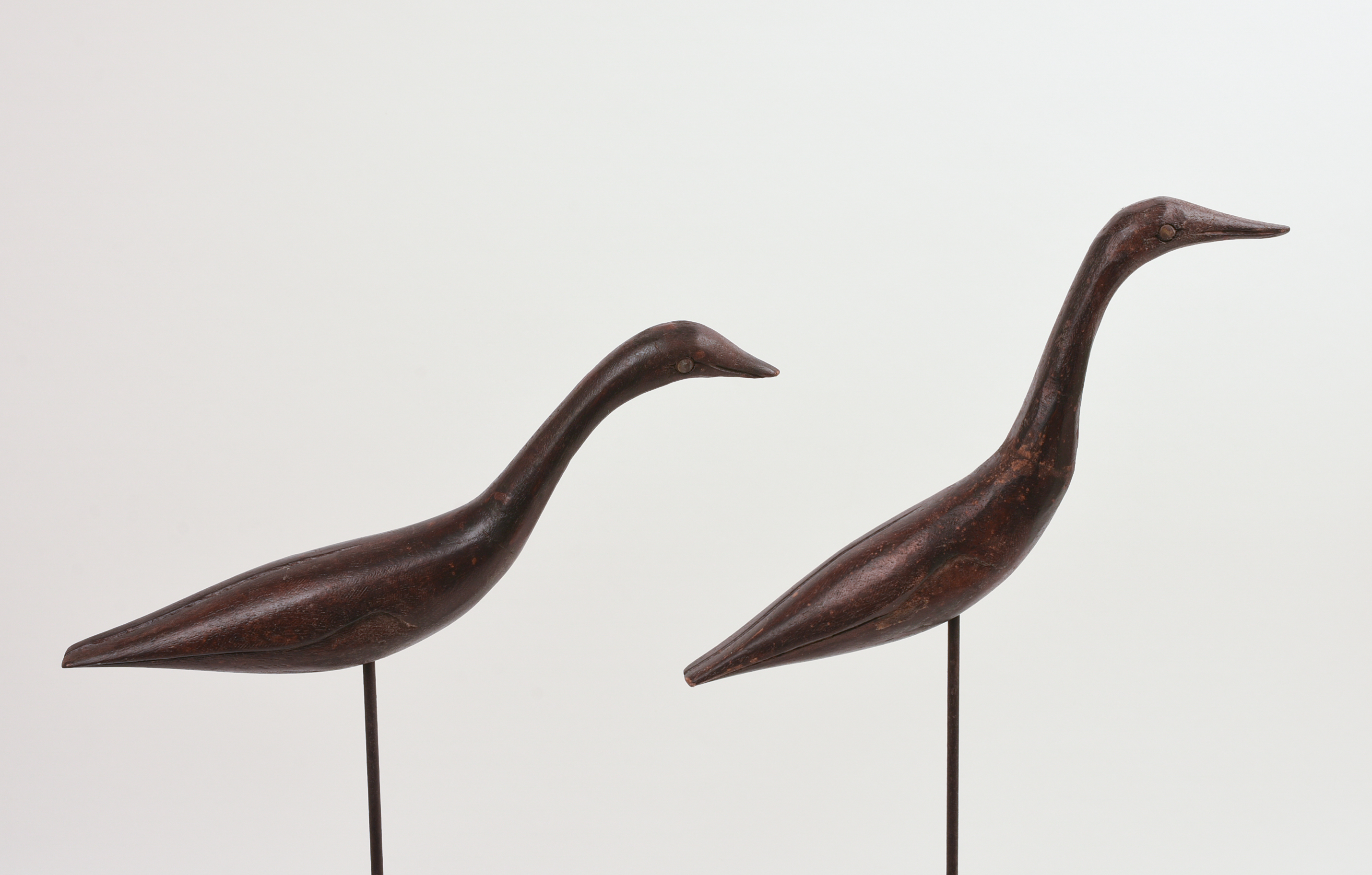 TWO EARLY 20TH CENTURY WOOD SHORE BIRDS ON STANDS.