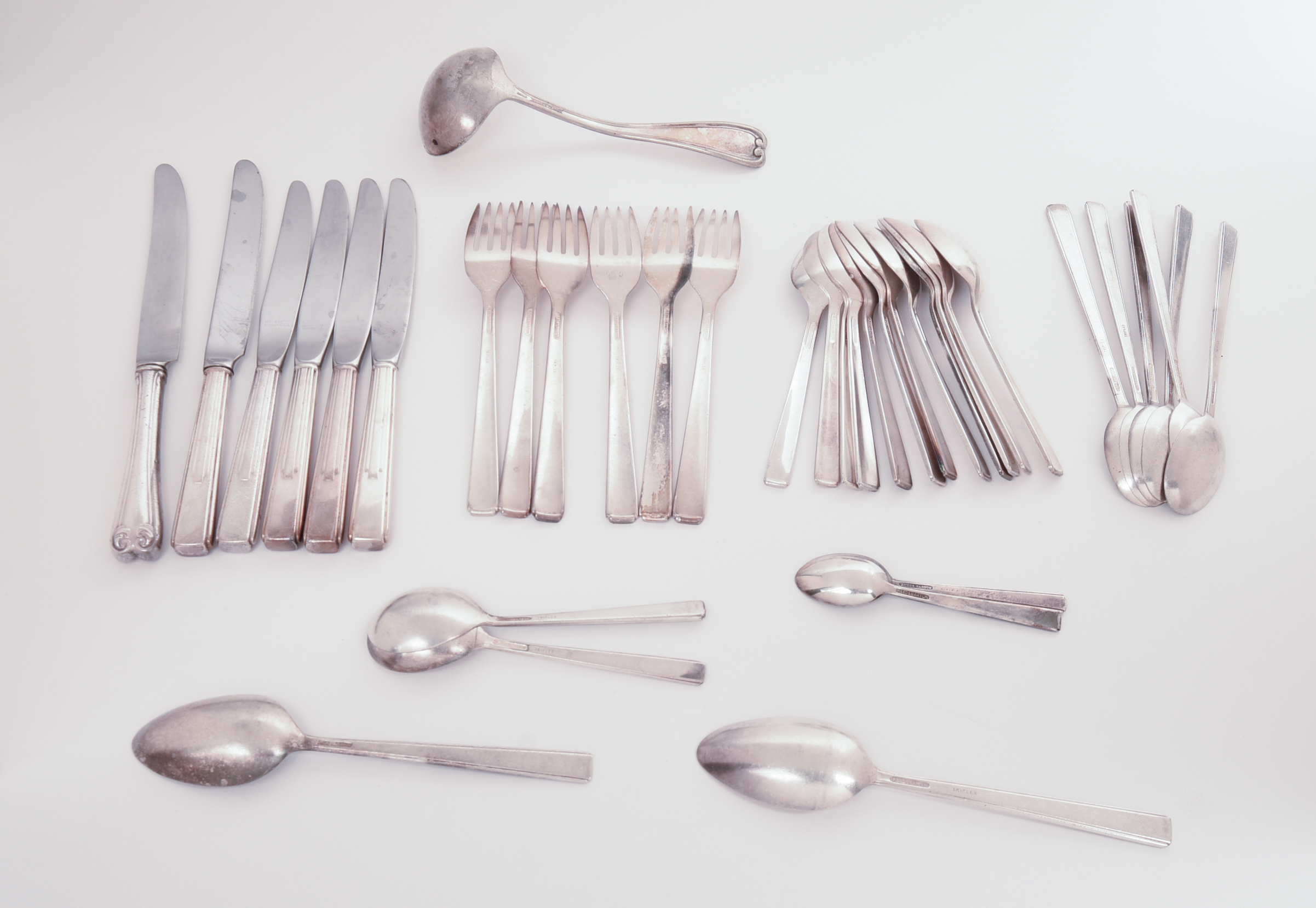 BURLINGTON RAILROAD SILVERPLATE FLATWARE SET.