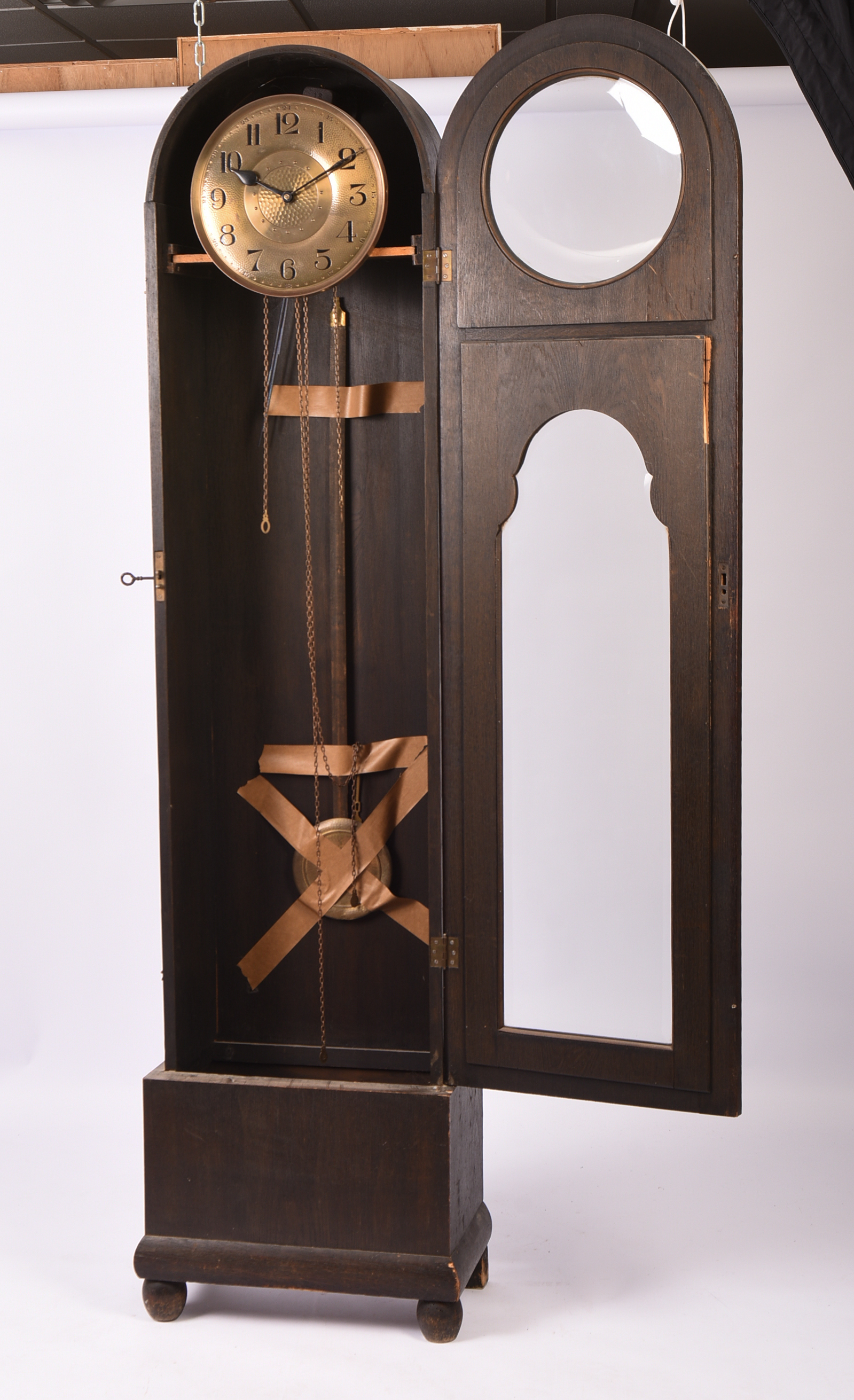 Oak Tall Case Clock With Hammered Copper Face.