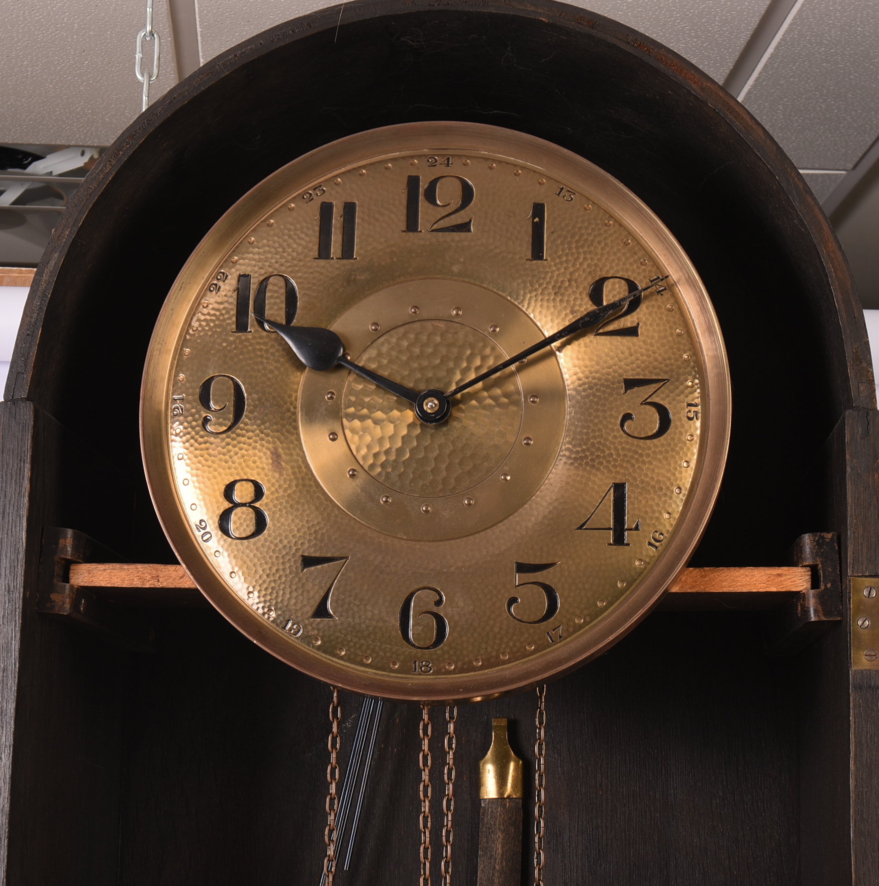 Oak Tall Case Clock With Hammered Copper Face.