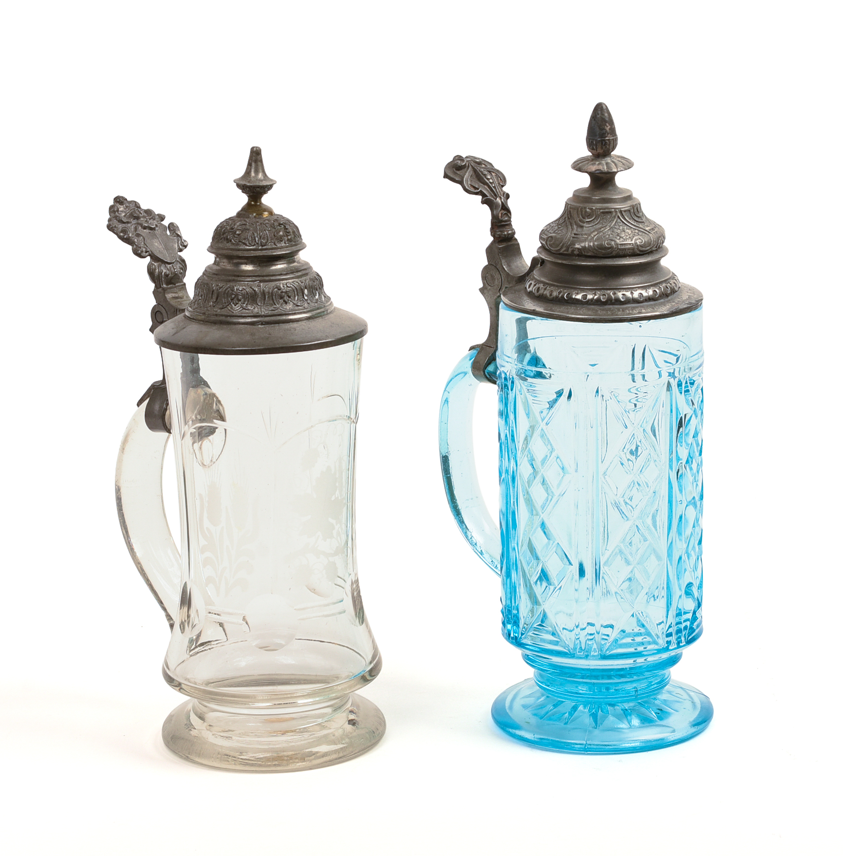Two Glass Steins With Pewter Tops.