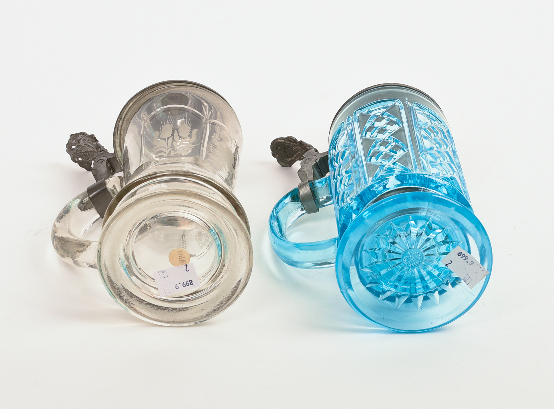 Two Glass Steins With Pewter Tops.