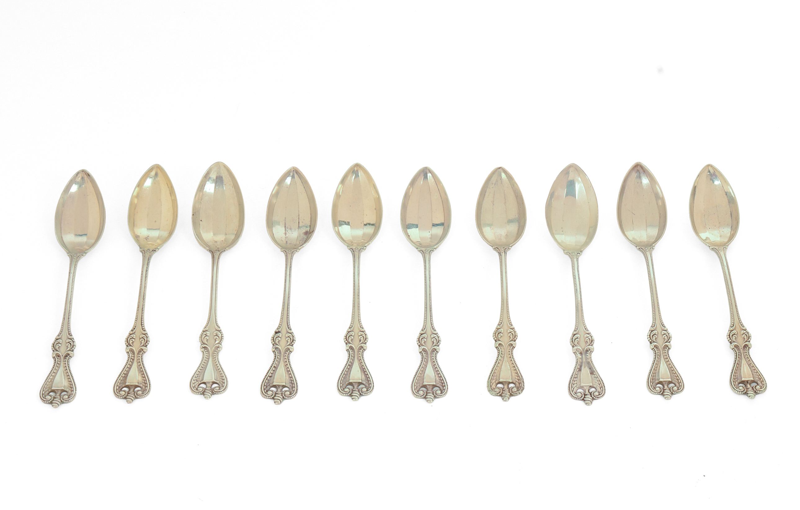 Ten Sterling Silver Grapefruit Spoons.