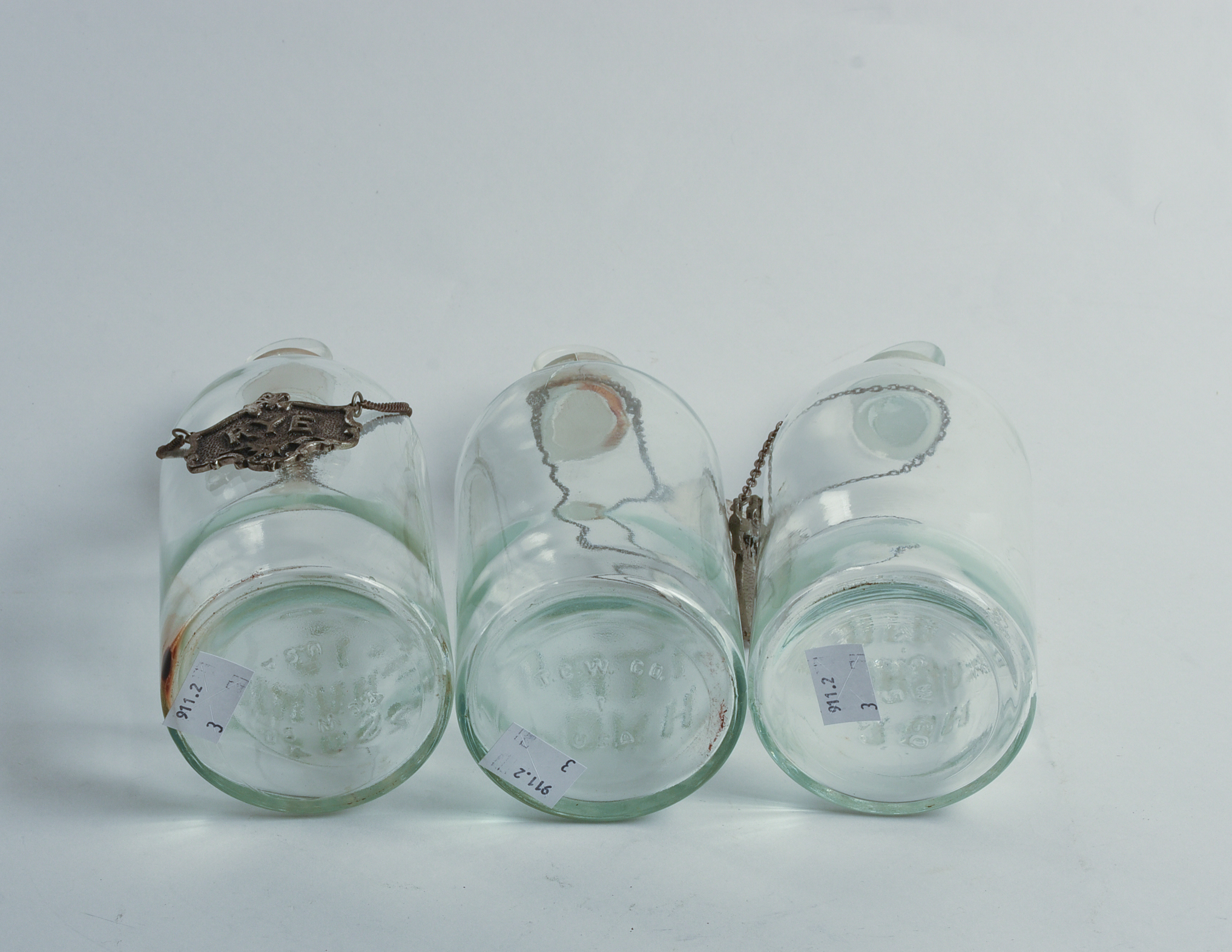 Three Blown Glass Acid Bottles.