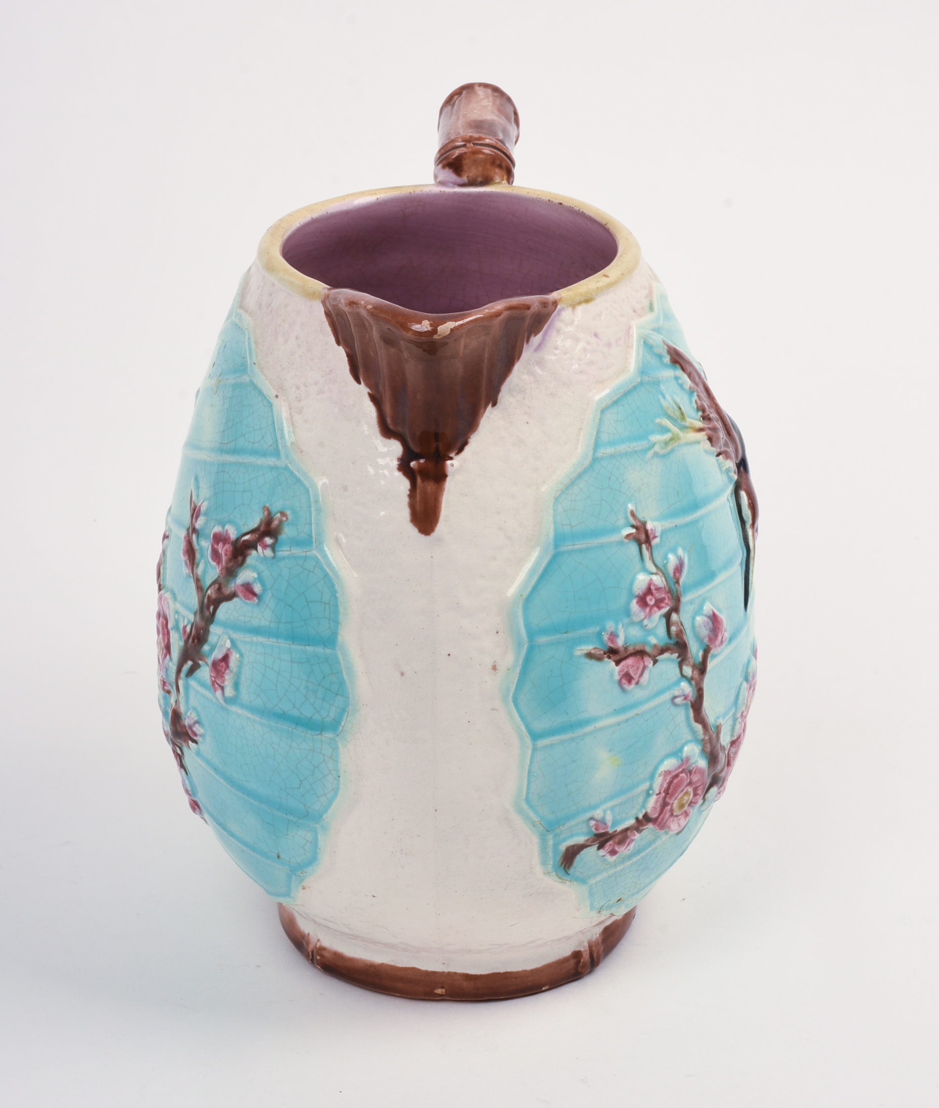 Majolica Pitcher with Birds and Flowers.