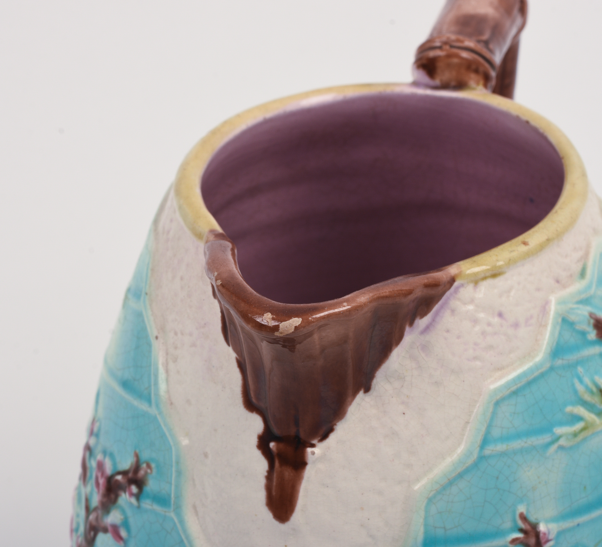Majolica Pitcher with Birds and Flowers.