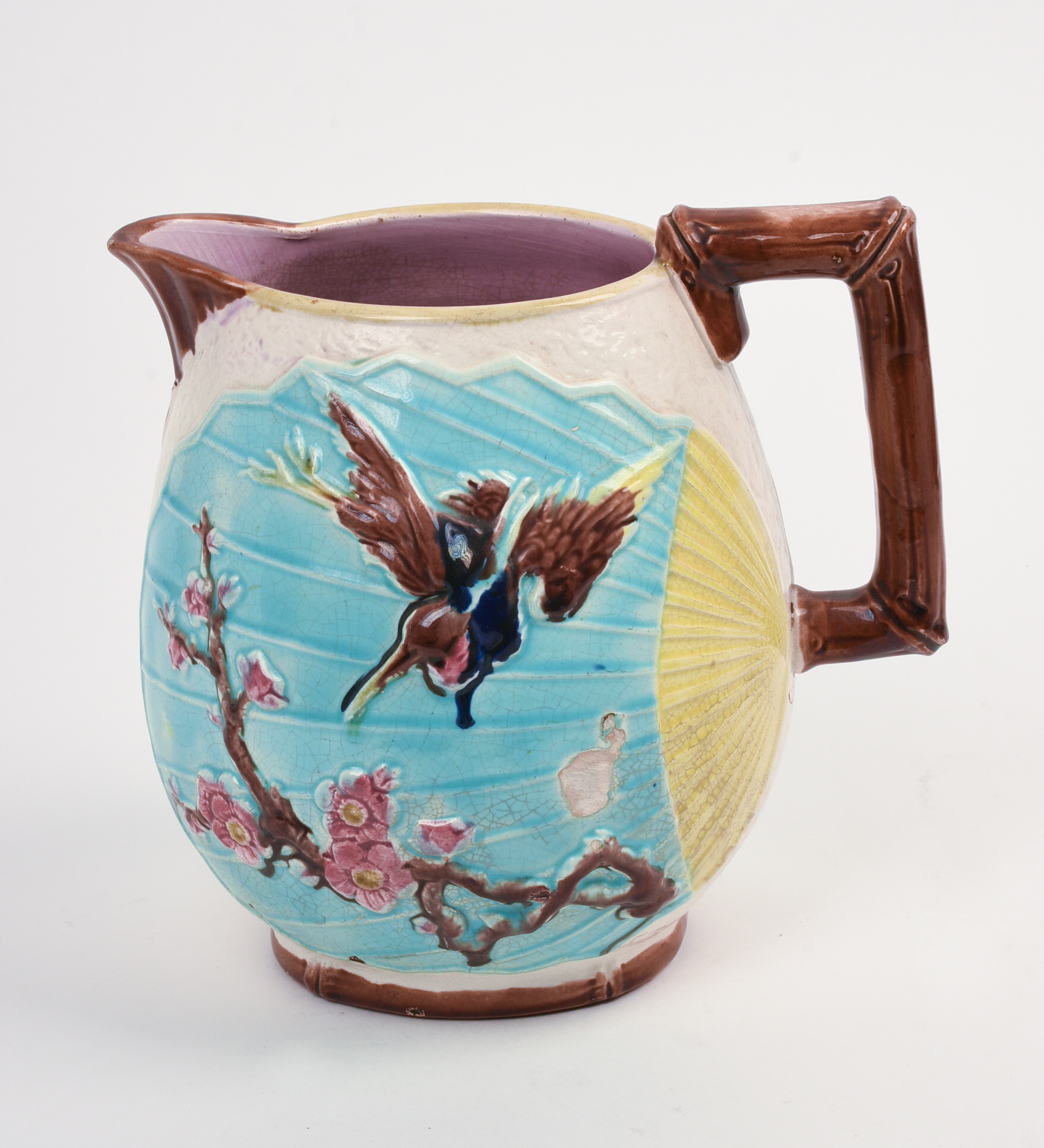 Majolica Pitcher with Birds and Flowers.