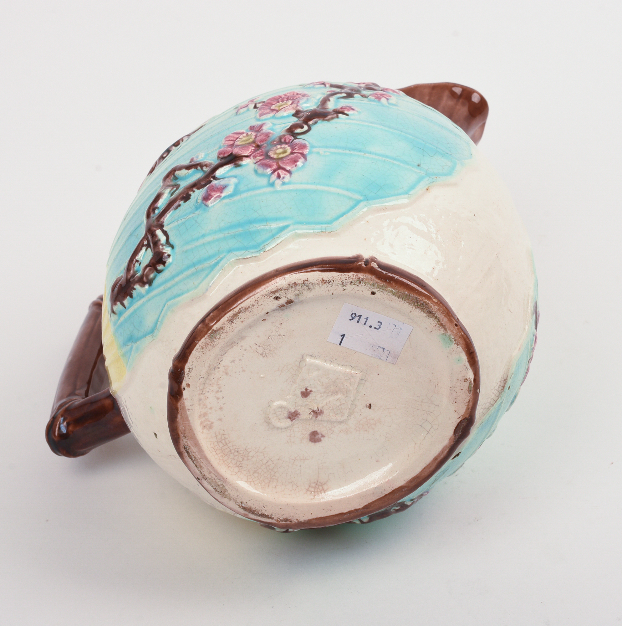 Majolica Pitcher with Birds and Flowers.
