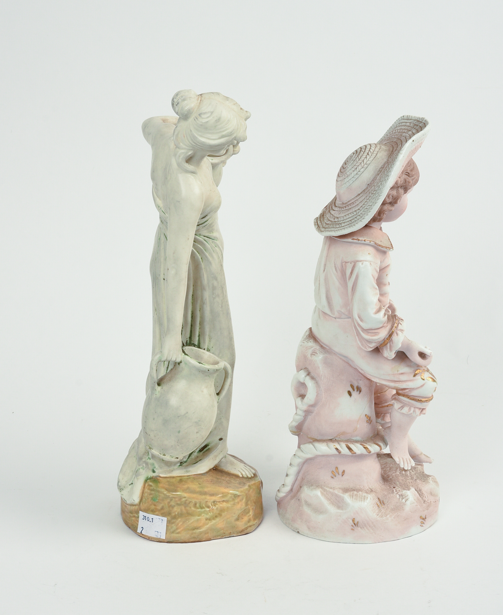 Pair of European Porcelain Figures.