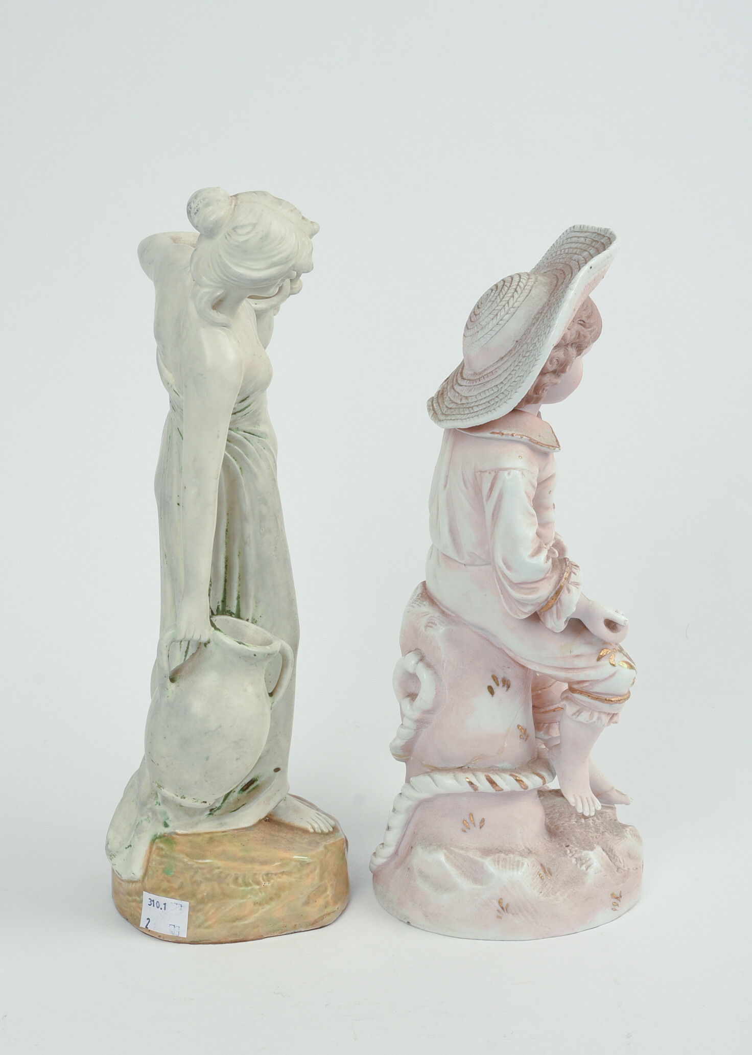 Pair of European Porcelain Figures.