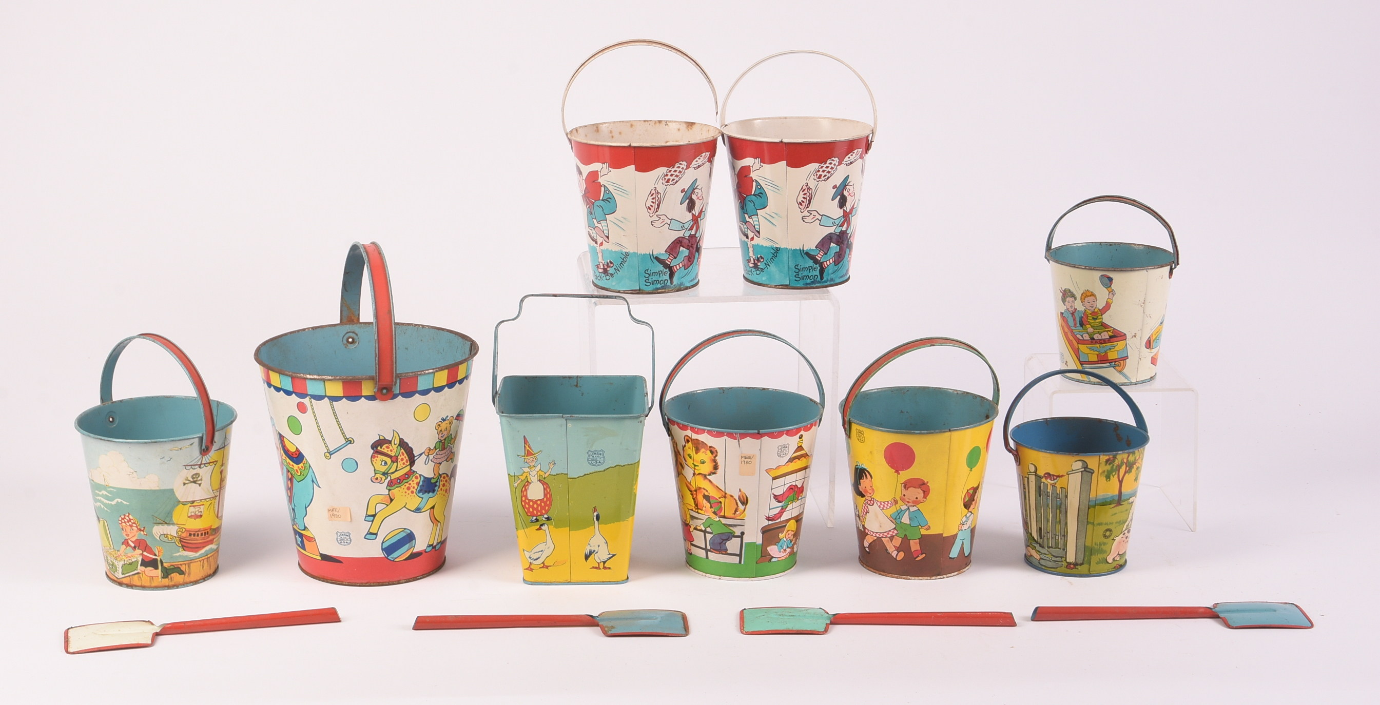 Nine Vintage Metal Children's Beach Pails.