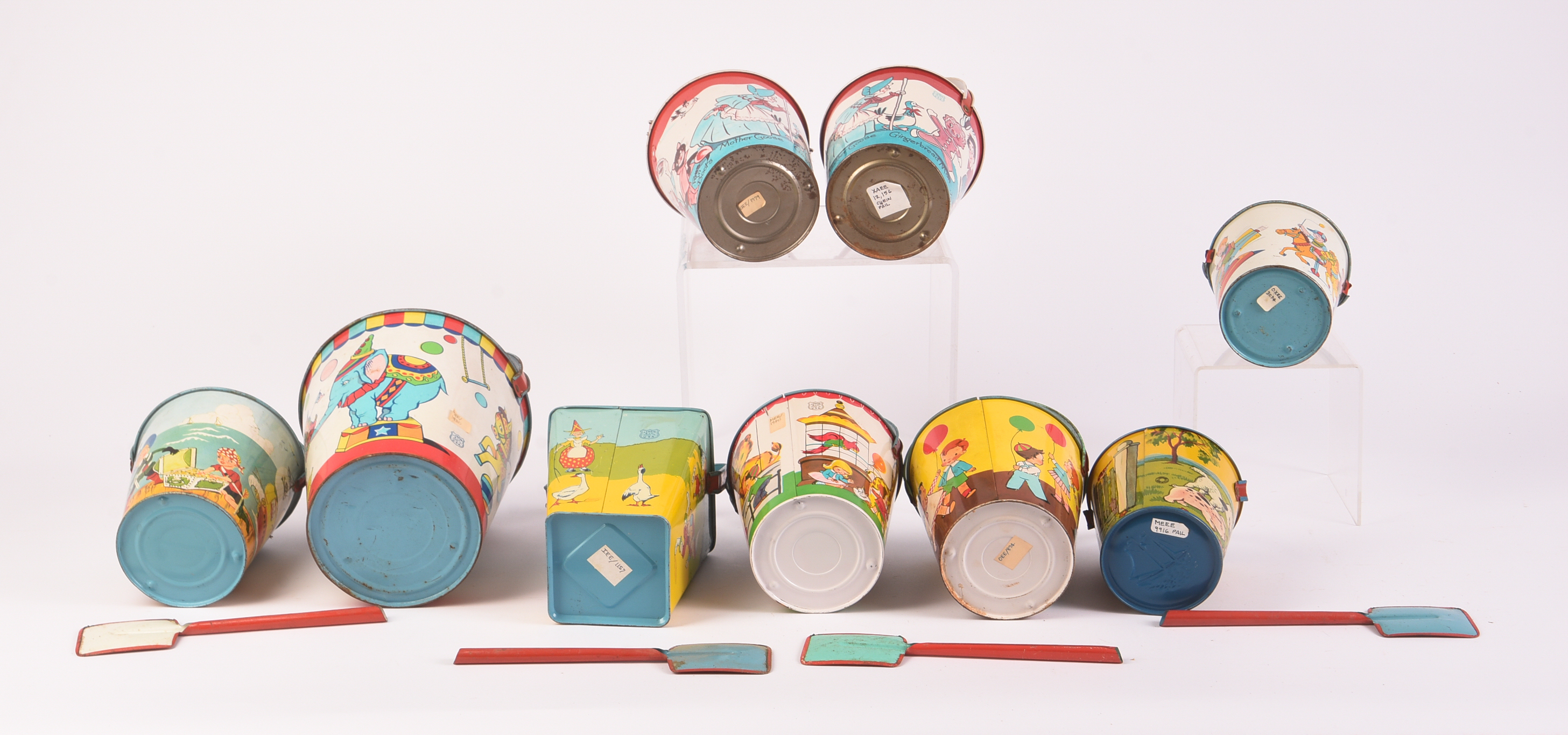 Nine Vintage Metal Children's Beach Pails.