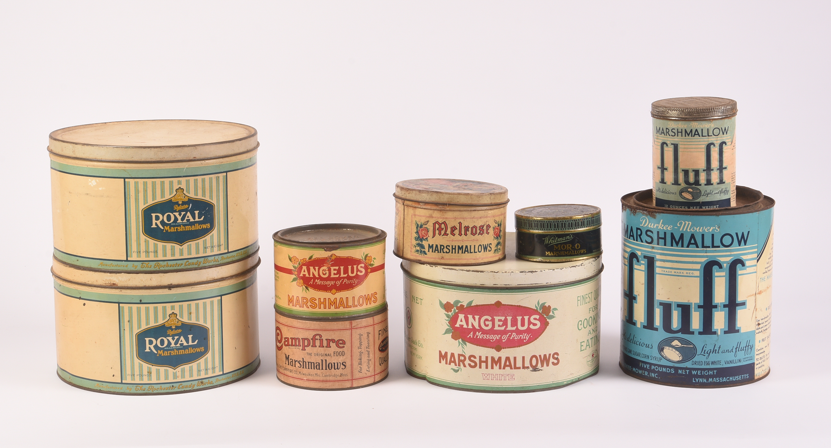 Nine Vintage Marshmallow Tins.
