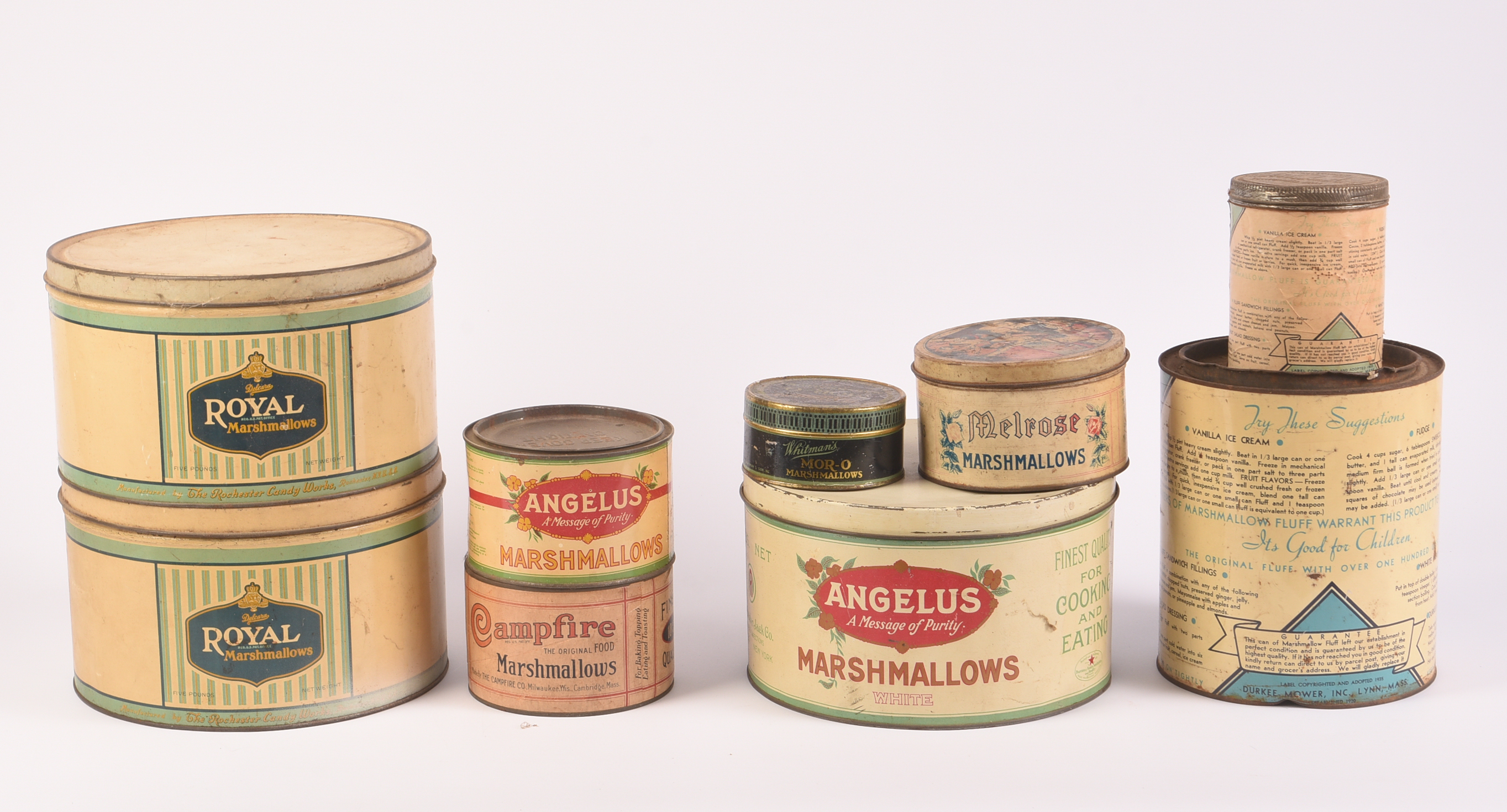Nine Vintage Marshmallow Tins.