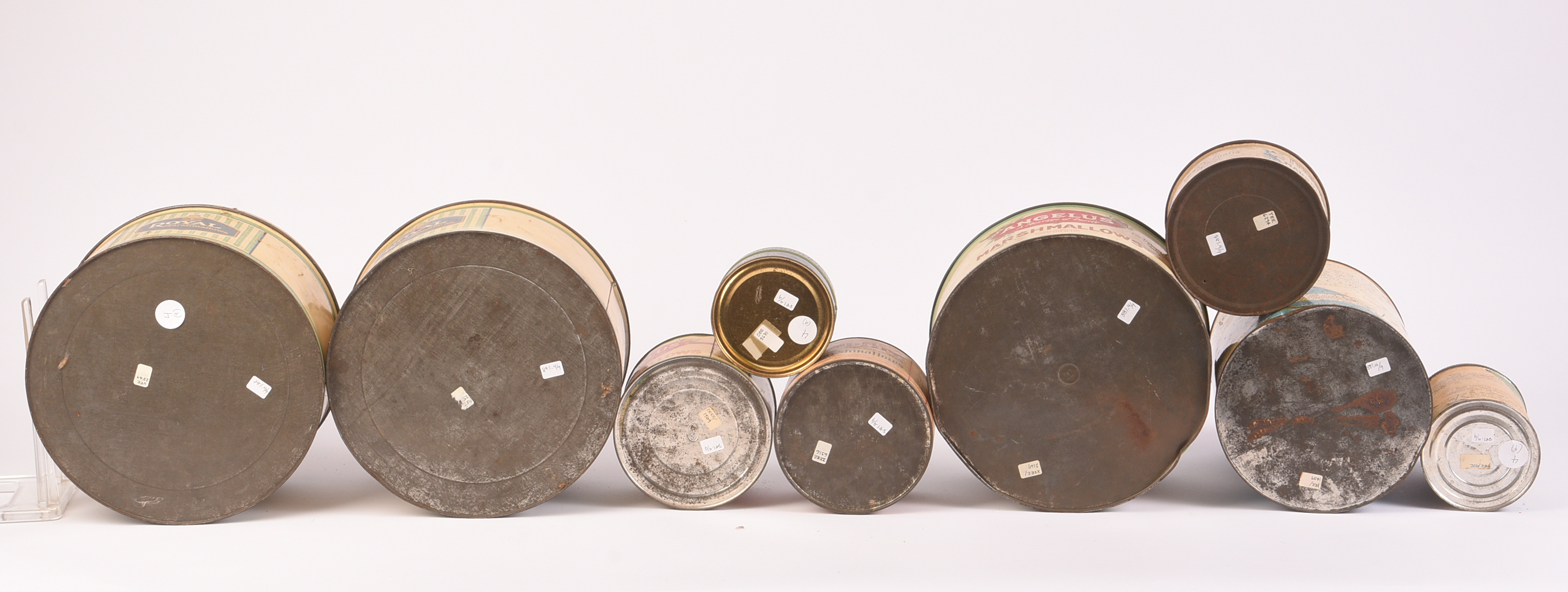 Nine Vintage Marshmallow Tins.