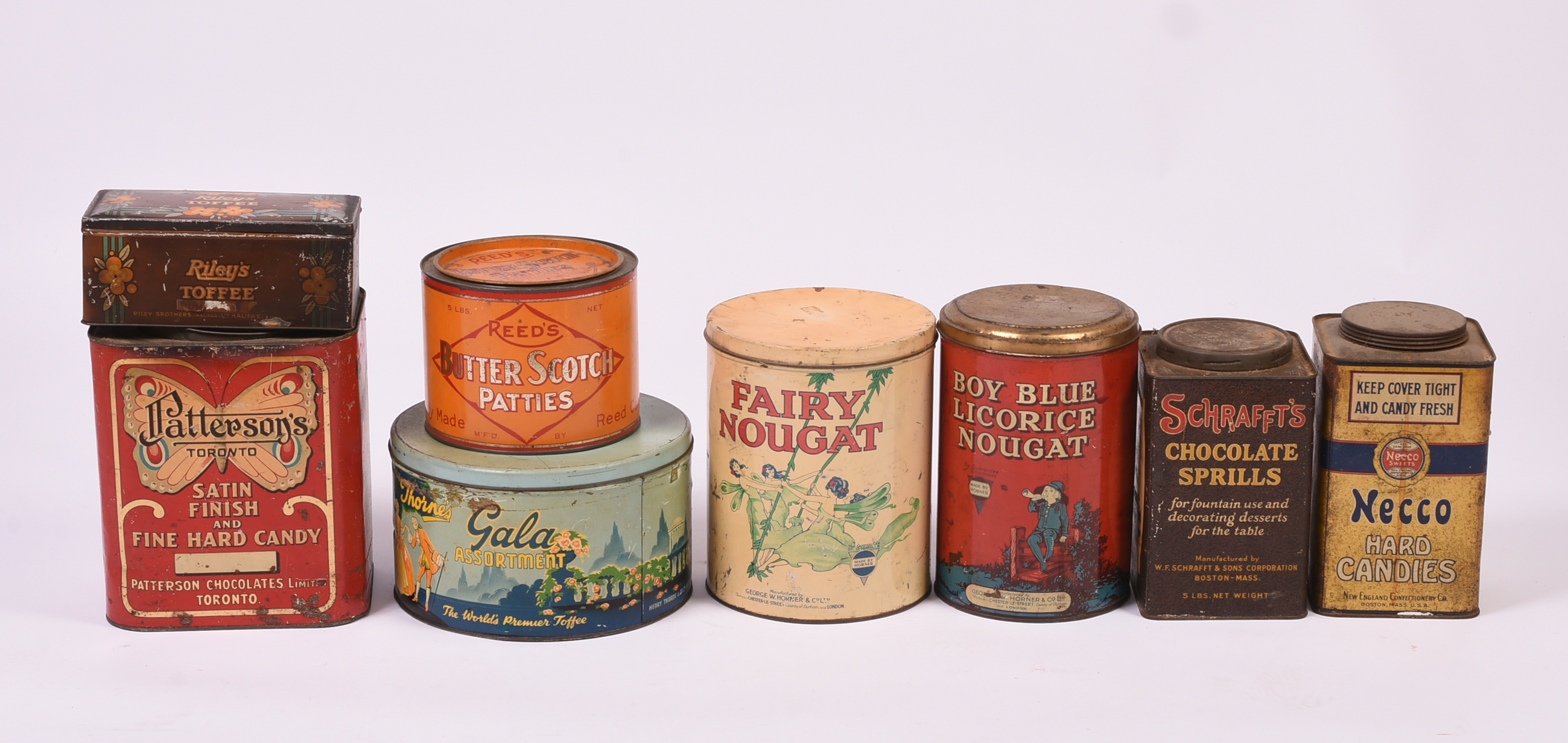 Eight Vintage Confectionary Tins.