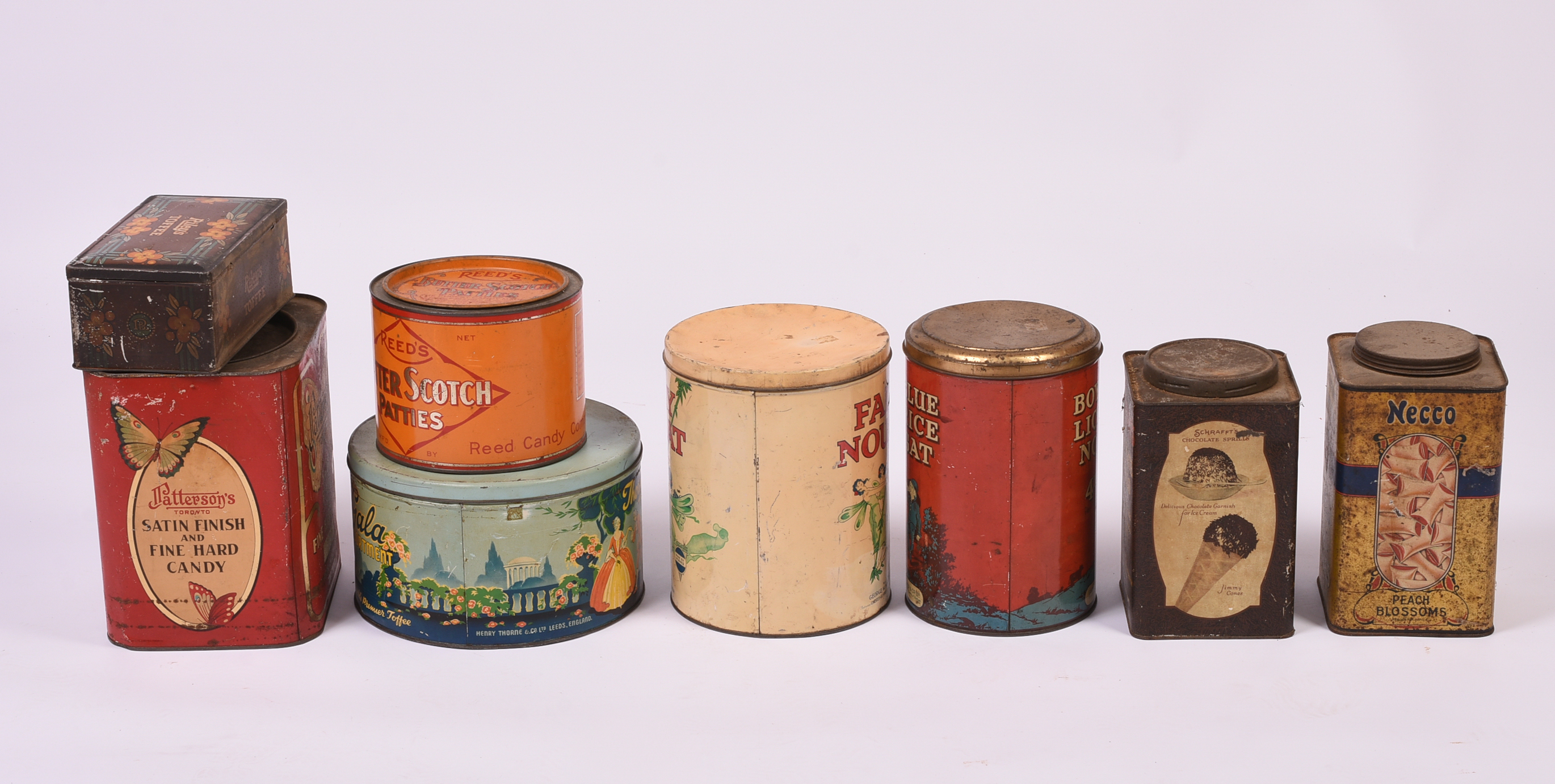 Eight Vintage Confectionary Tins.