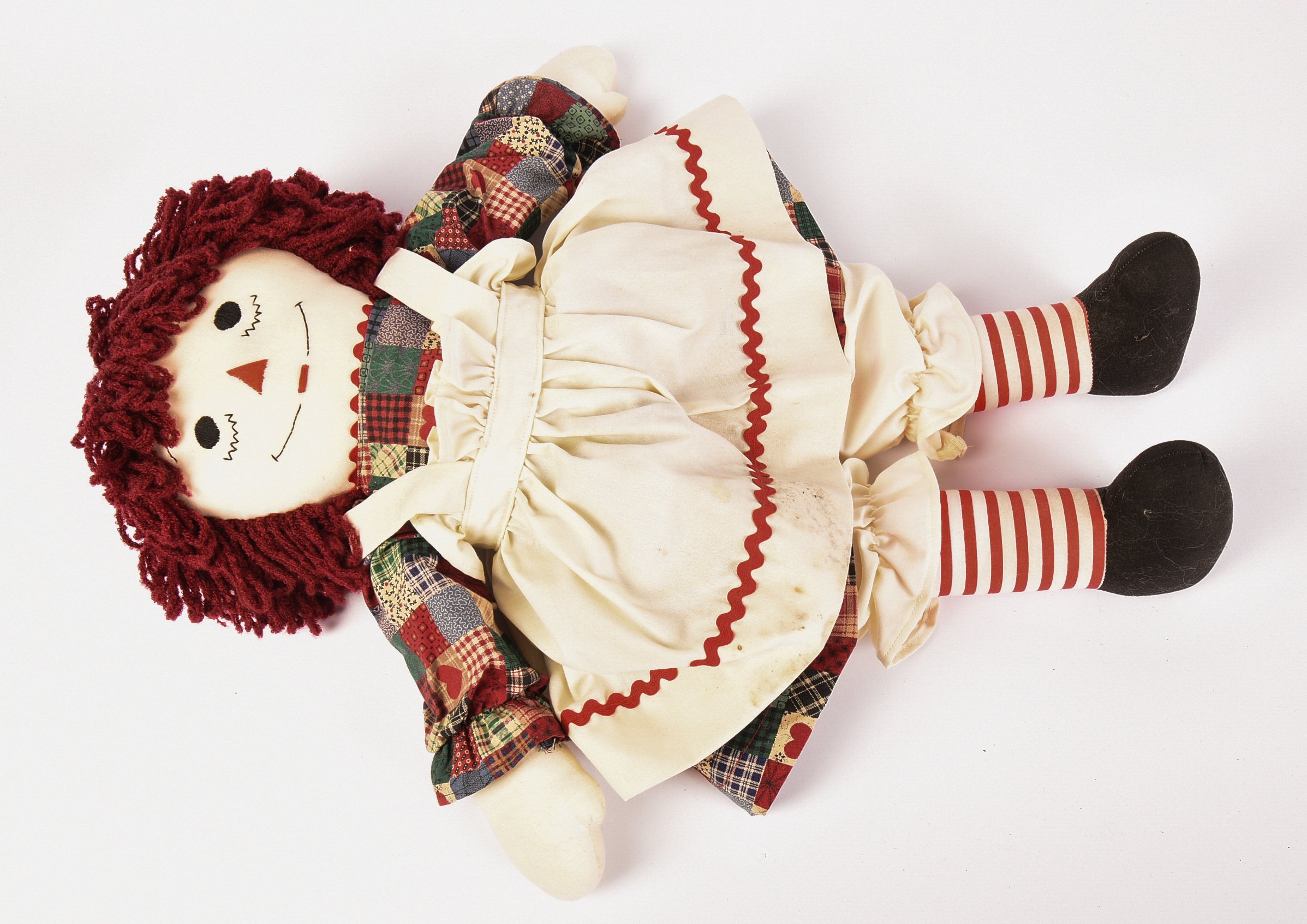 Group of Raggedy Ann Dolls and Books.