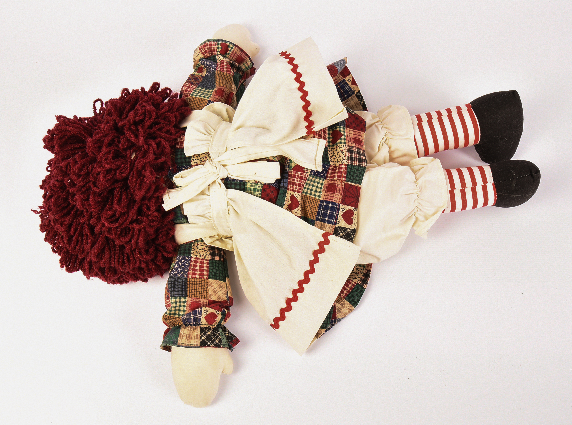 Group of Raggedy Ann Dolls and Books.