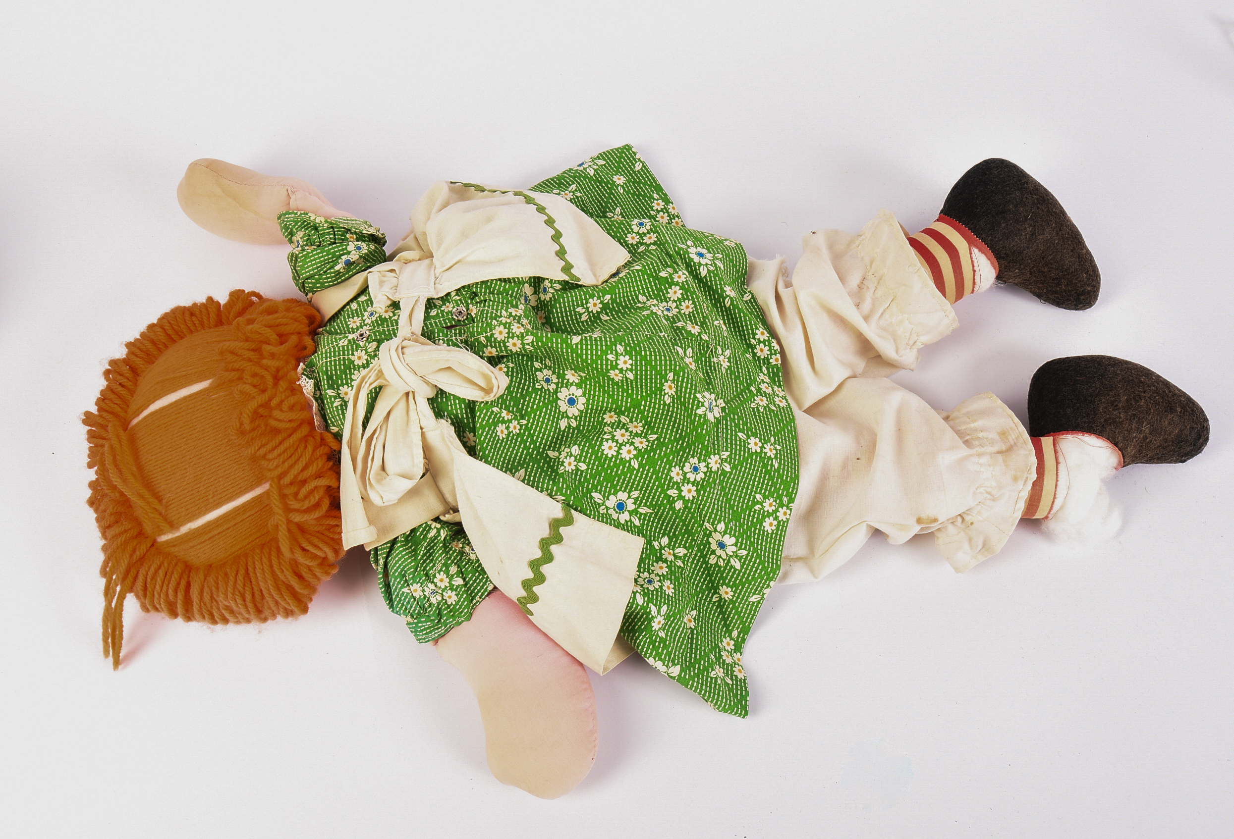 Group of Raggedy Ann Dolls and Books.