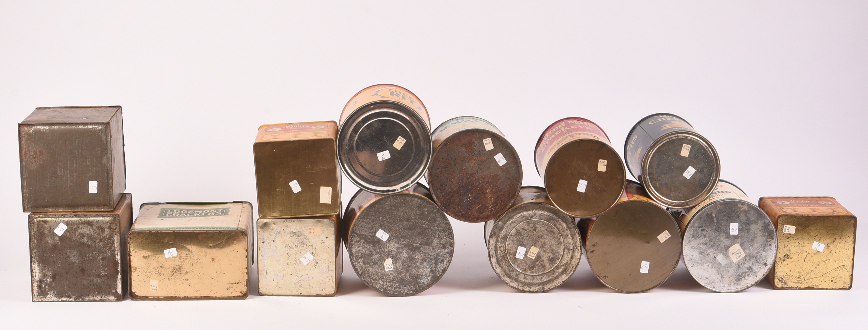 Fourteen Vintage Cracker Tins.