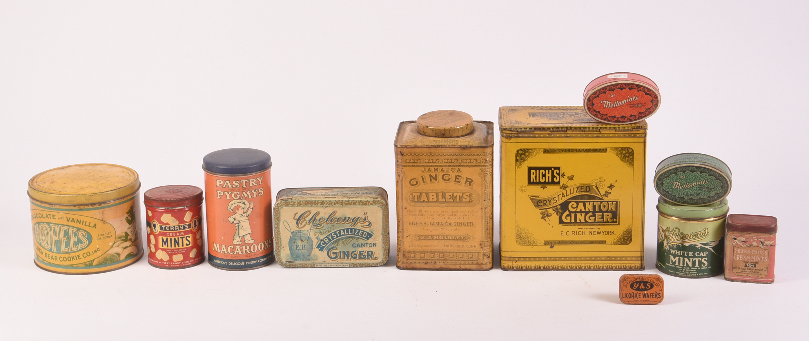Eleven Vintage Candy, Confection, and Mints Tins.