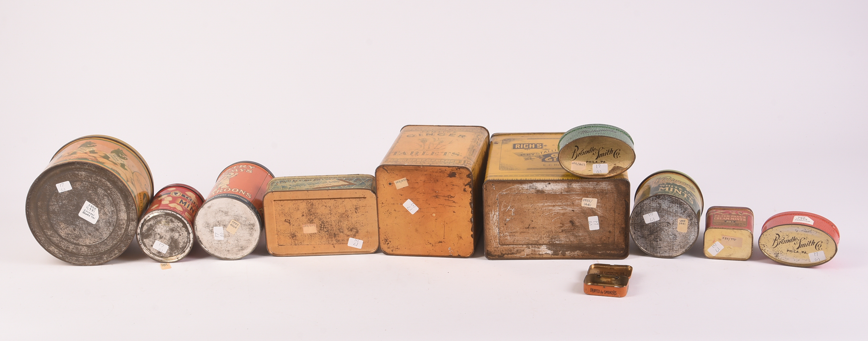Eleven Vintage Candy, Confection, and Mints Tins.