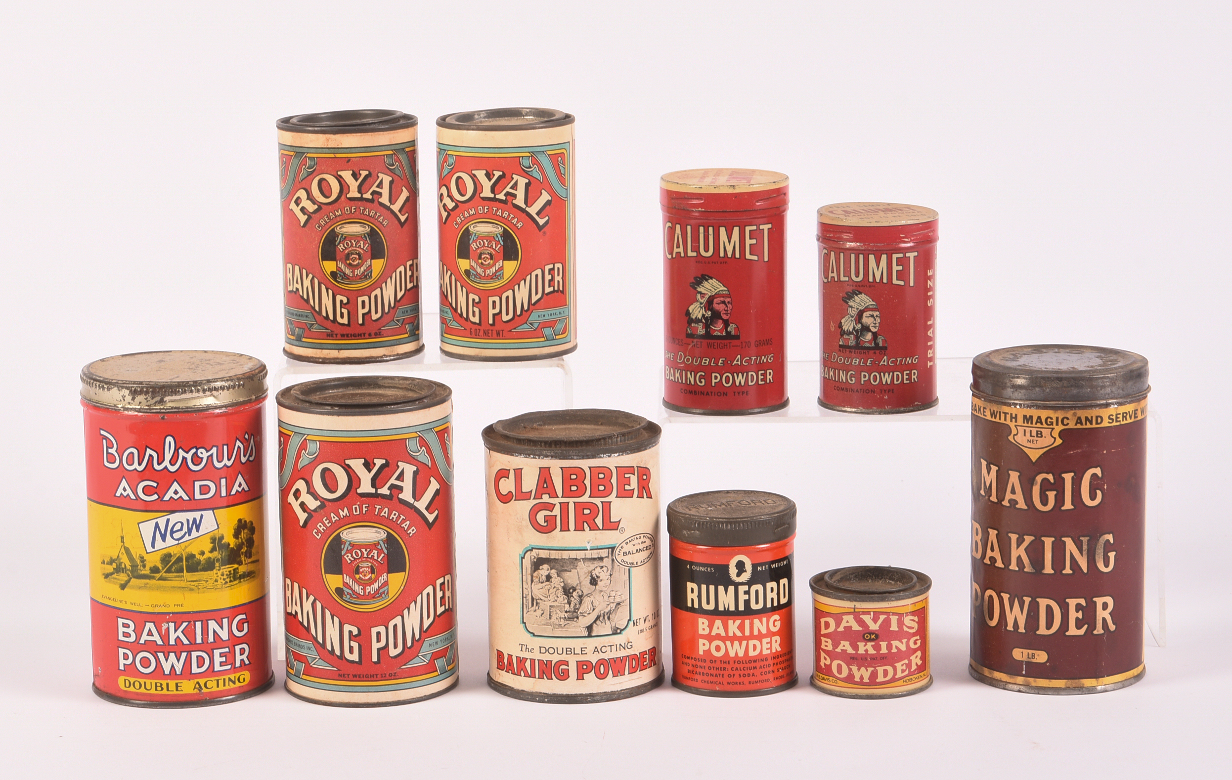 Ten Vintage Baking Powder Tins.