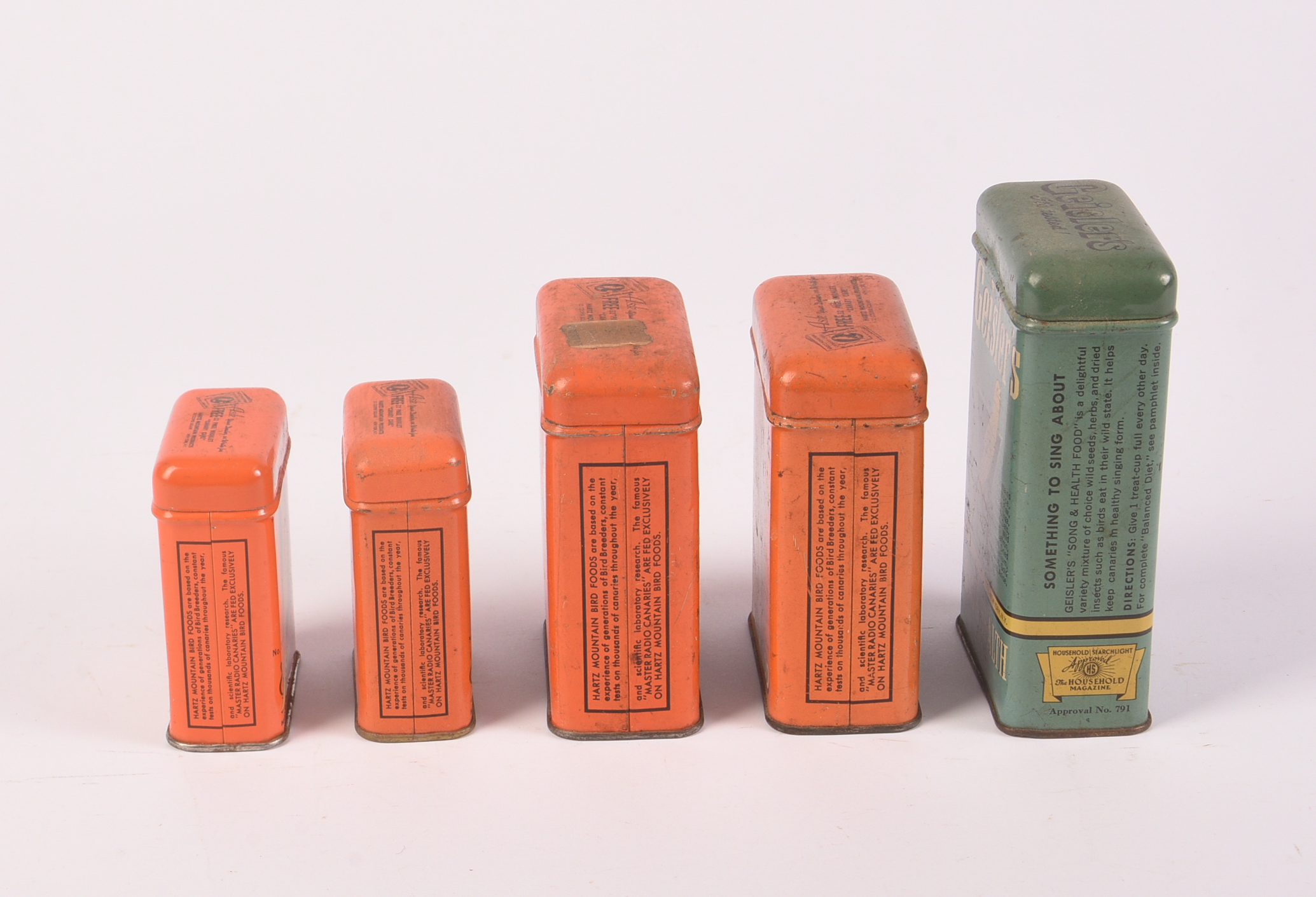 Five Vintage Bird Food Tins.