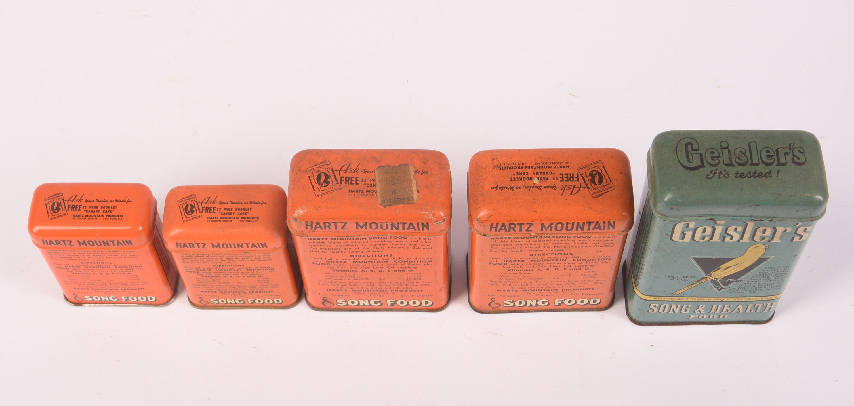 Five Vintage Bird Food Tins.