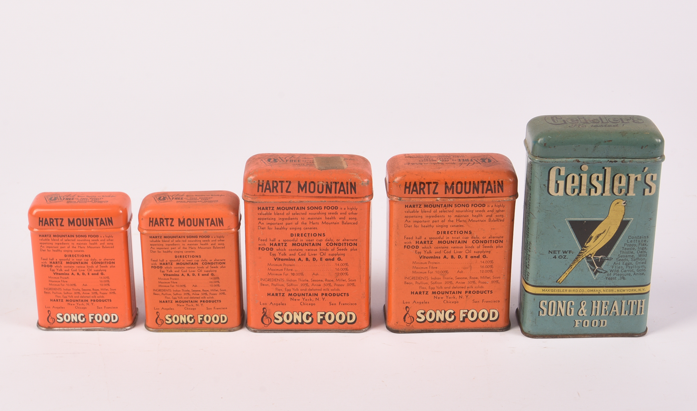 Five Vintage Bird Food Tins.